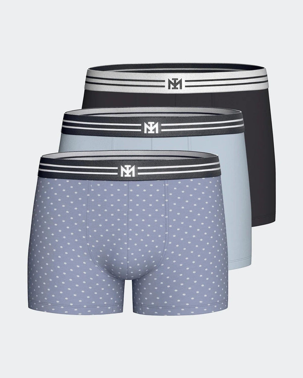 Maison Sarava pack of 3 men's cotton boxers: one blue with micro logo pattern, one light blue, one black. Comfortable elastic waistband.