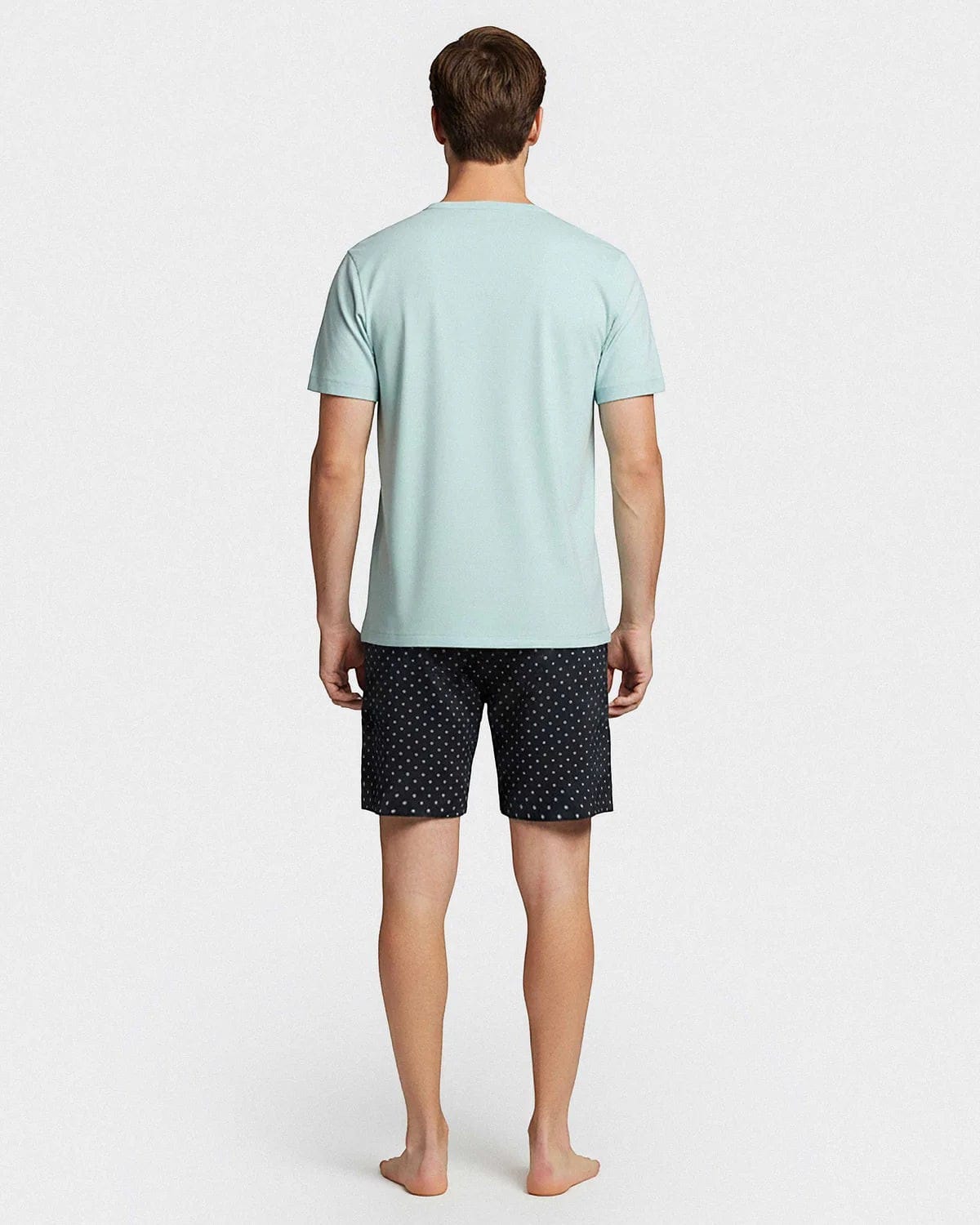Maison Sarava men's light blue cotton t-shirt and navy micro-logo pattern shorts loungewear set.