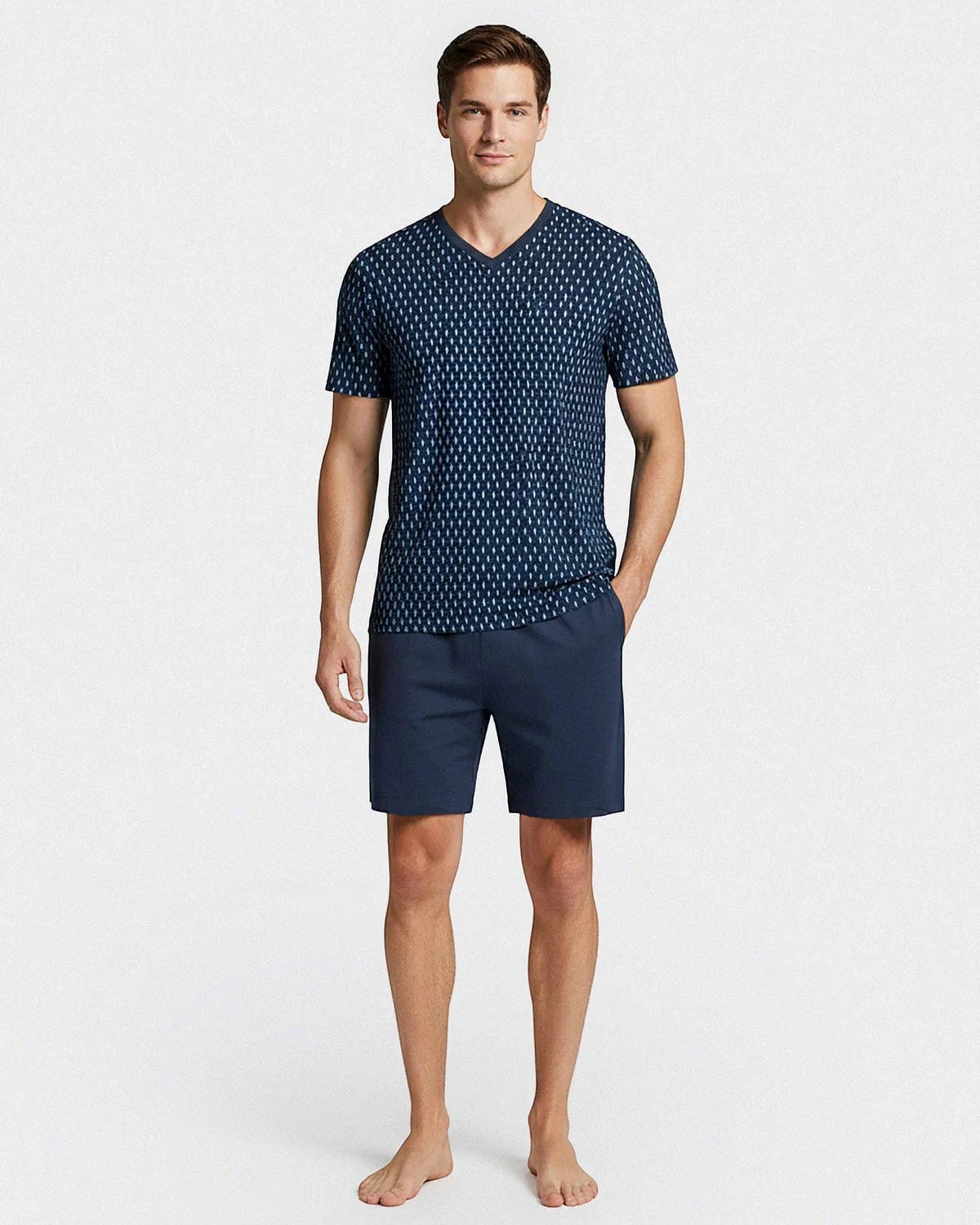 Maison Sarava men's navy blue cotton short sleeve lounge set with a geometric pattern and matching navy shorts.