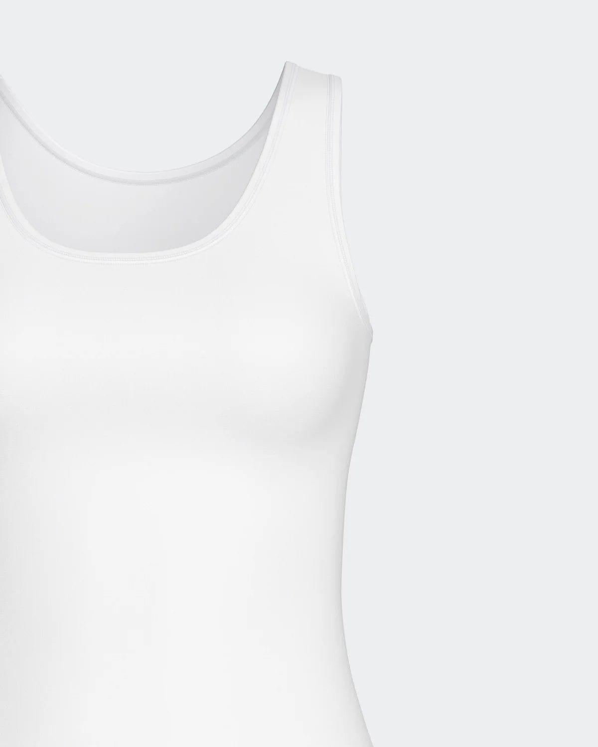 Maison Sarava white cotton and viscose blend women's tank top with Outlast technology for temperature regulation.