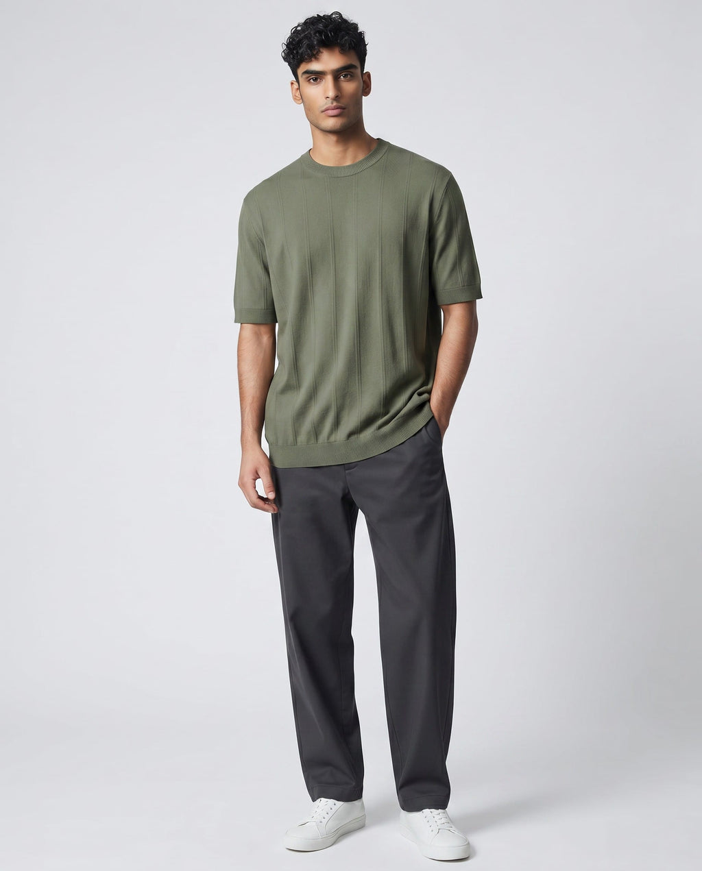 Maison Sarava men's olive green textured knit short sleeve sweater with crew neck and ribbed cuffs and hem.