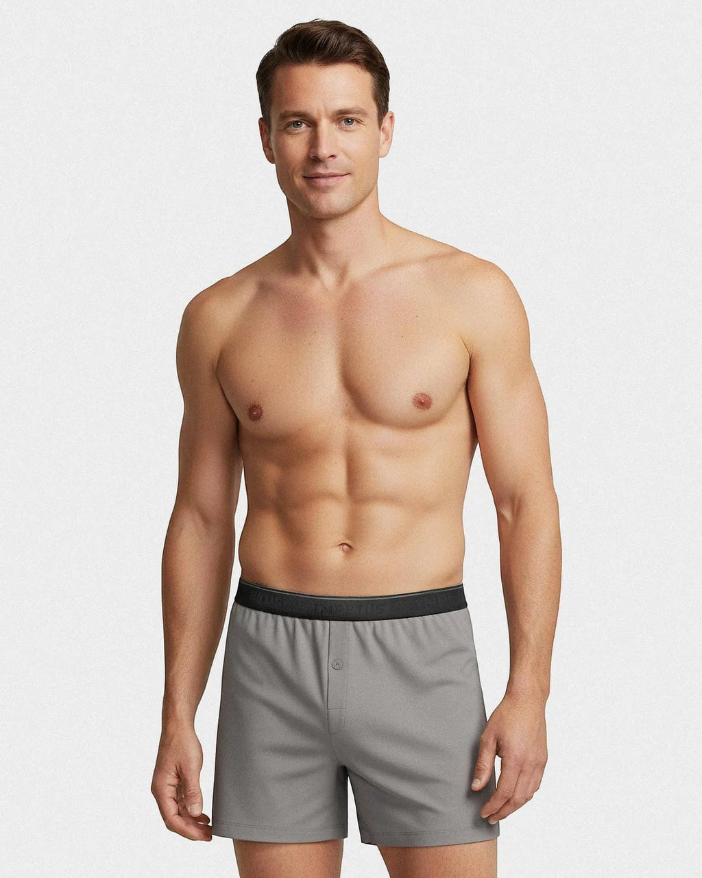 Maison Sarava grey cotton boxer briefs with black branded waistband and button fly, worn by a male model.