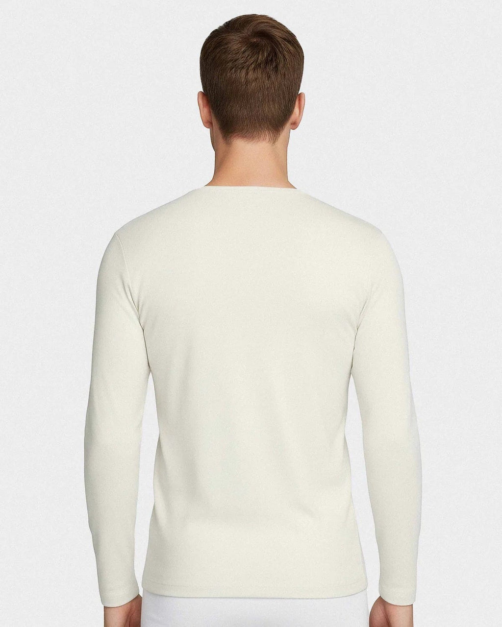 Maison Sarava men's cream long-sleeved V-neck t-shirt made from premium Merino wool and Lyocell for thermal regulation and breathability.