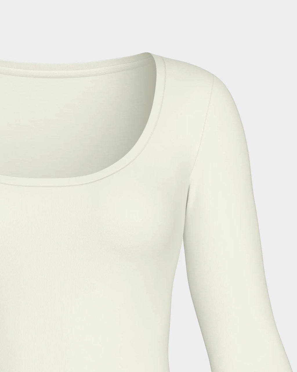 Maison Sarava cream long sleeve scoop neck tee made from soft Merino wool and Lyocell blend.
