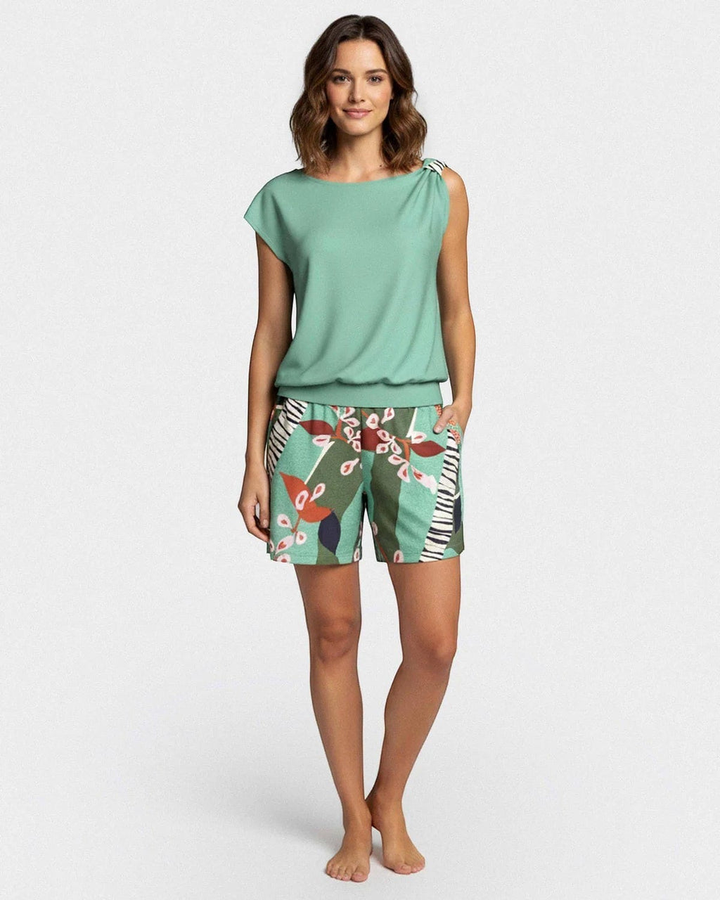 Maison Sarava women's mint green modal lounge set with botanical print shorts and draped shoulder detail.