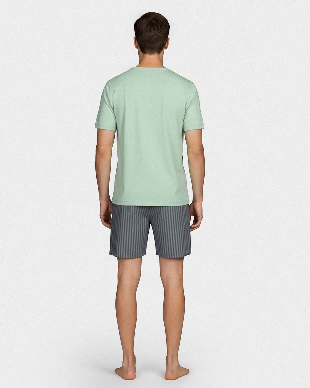 Maison Sarava men's light green short-sleeve lounge top with grey striped shorts made from TENCEL Modal and cotton.