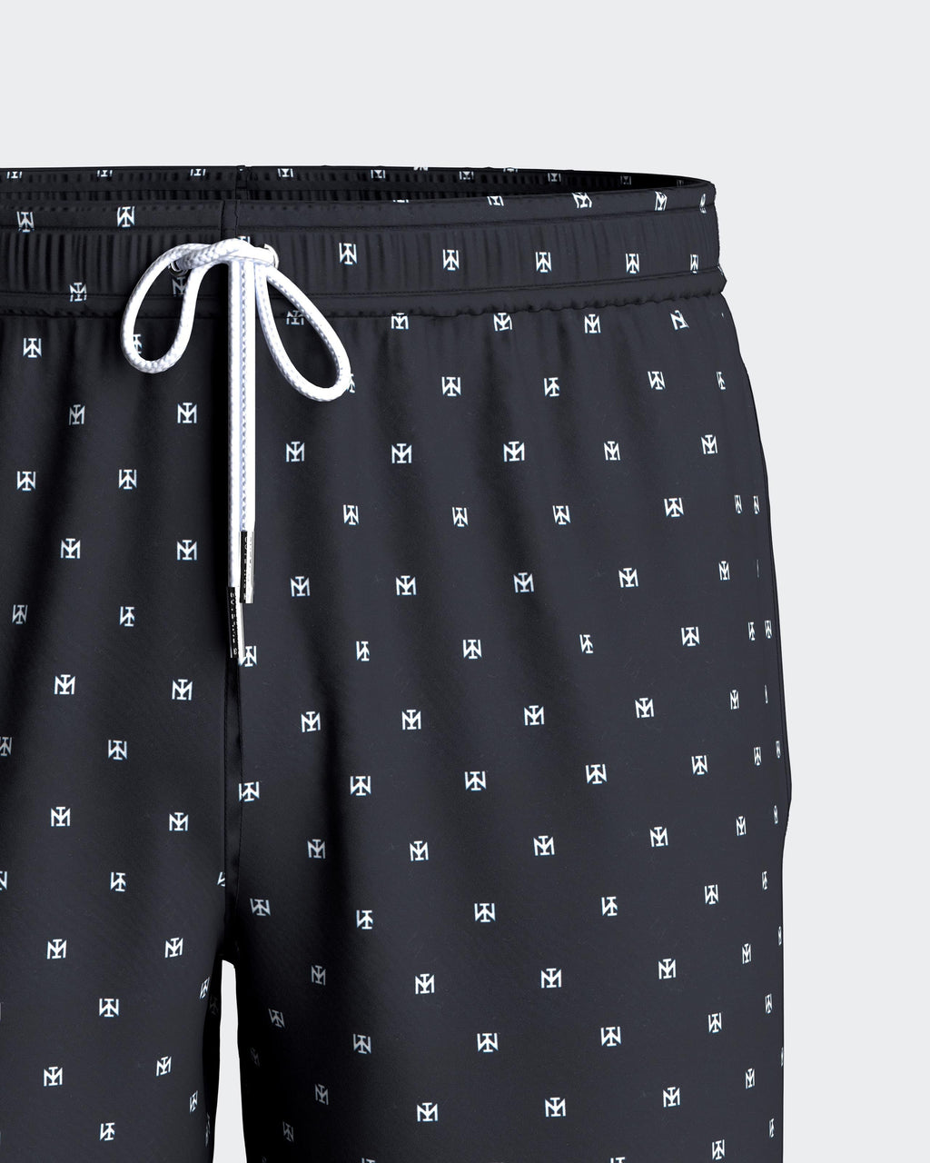 Maison Sarava men's black swim trunks with micro Impetus logo pattern, drawstring waist, side pockets, and inner mesh lining.