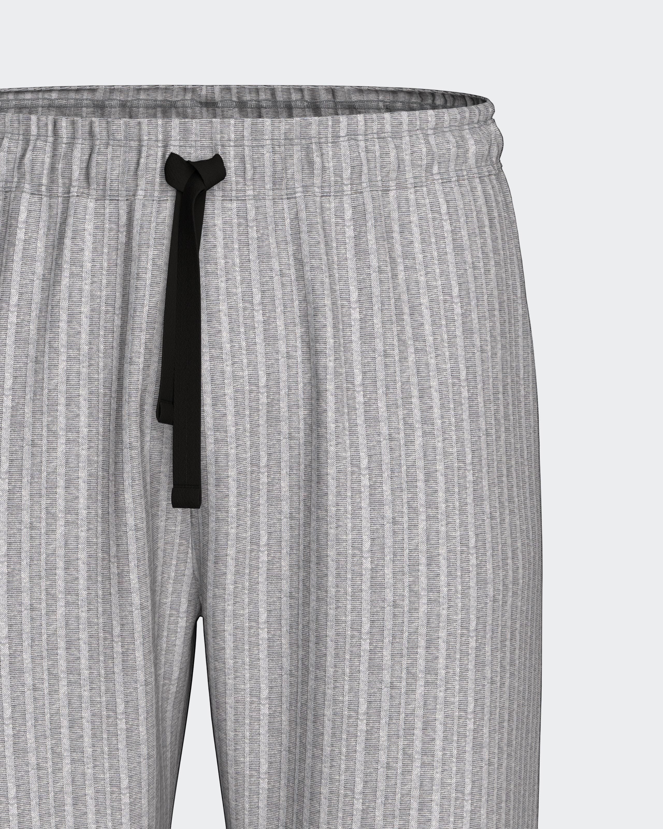Maison Sarava grey ribbed lounge pants with black drawstring waist. Comfortable, relaxed fit for home wear.