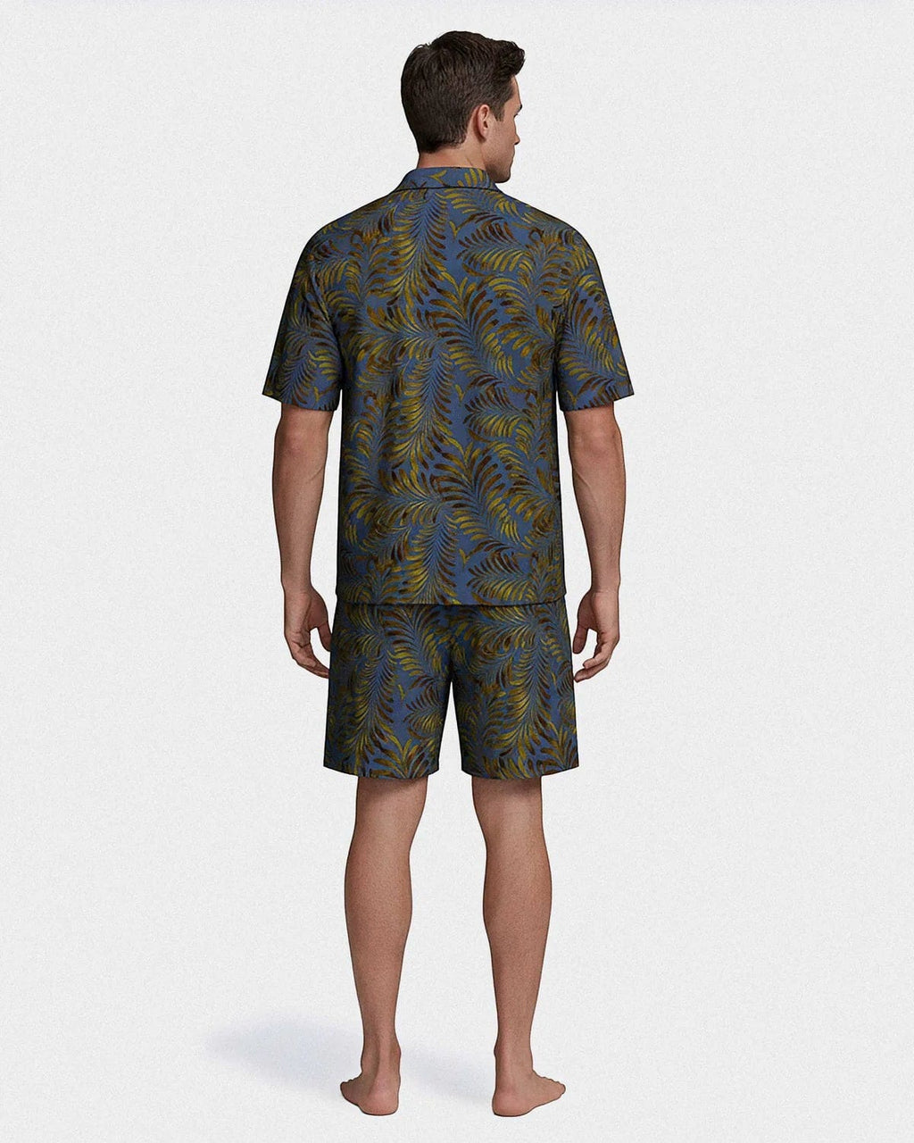 Maison Sarava men's blue lyocell lounge set with tropical print, short sleeves, lapel collar shirt and drawstring shorts.