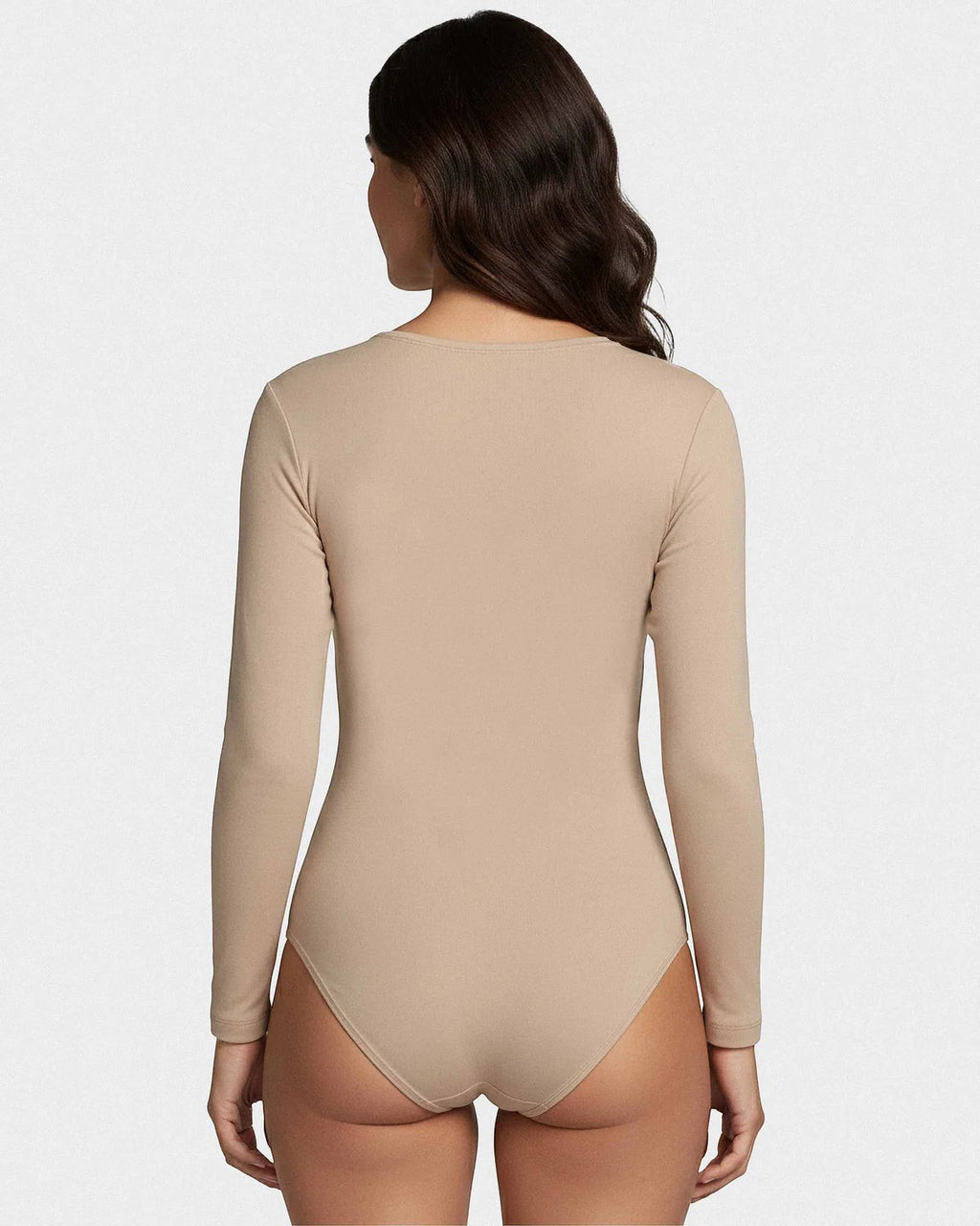 Maison Sarava long sleeve V-neck bodysuit in beige, made from soft, breathable fabric for a smooth fit.