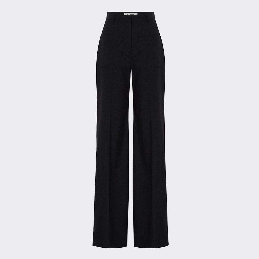 Maison Sarava black high-waist trousers with straight fit, two front patch pockets and A-design stitching detail below the knee.