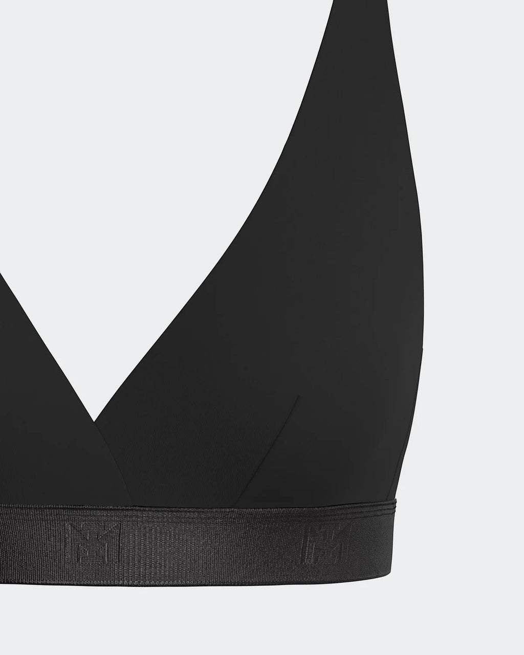 Maison Sarava black Lyocell triangular non-wired bra with adjustable straps and branded band.