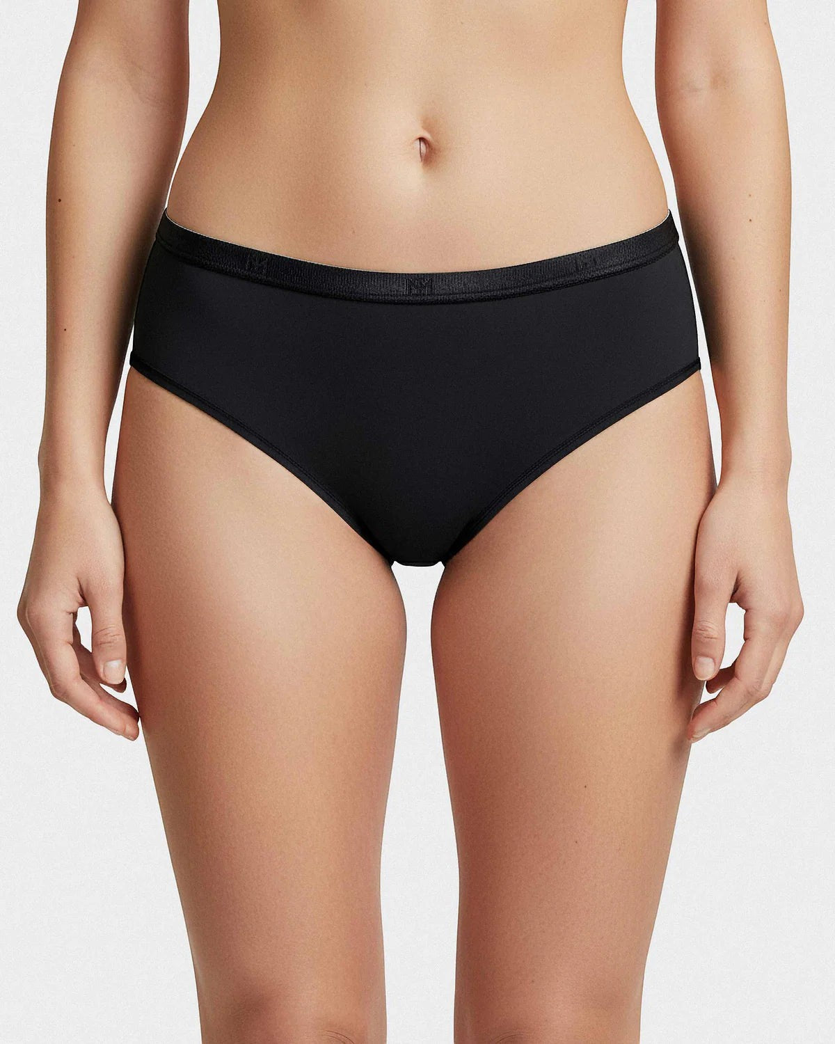 Maison Sarava black regular waist brief underwear made from soft, breathable TENCEL™ Lyocell with an elasticated waistband.