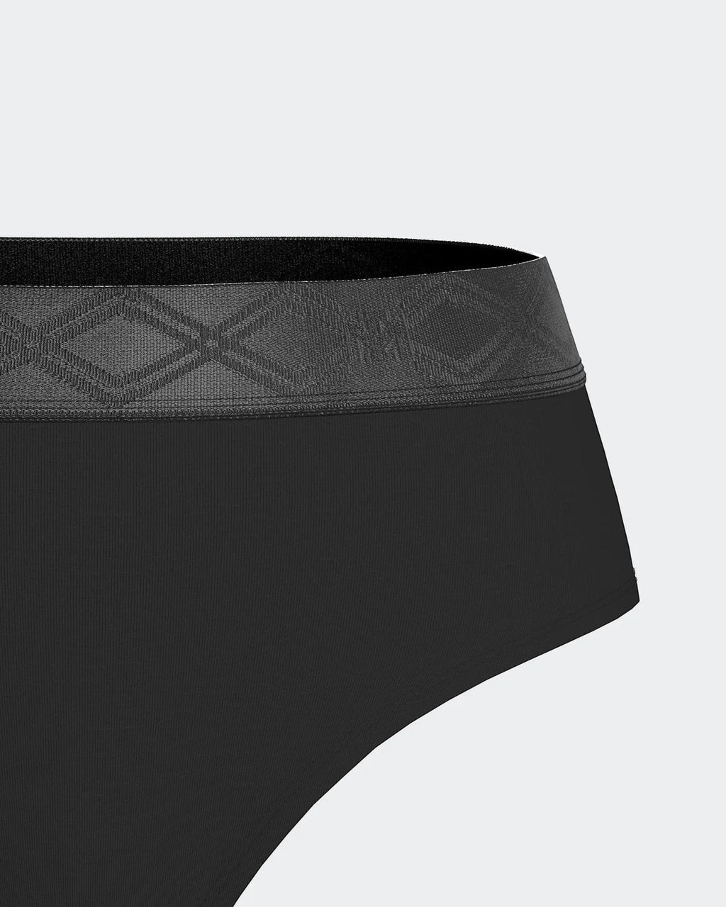 Maison Sarava black thong made from TENCEL™ Lyocell with a satin elasticated waistband featuring a subtle geometric pattern.