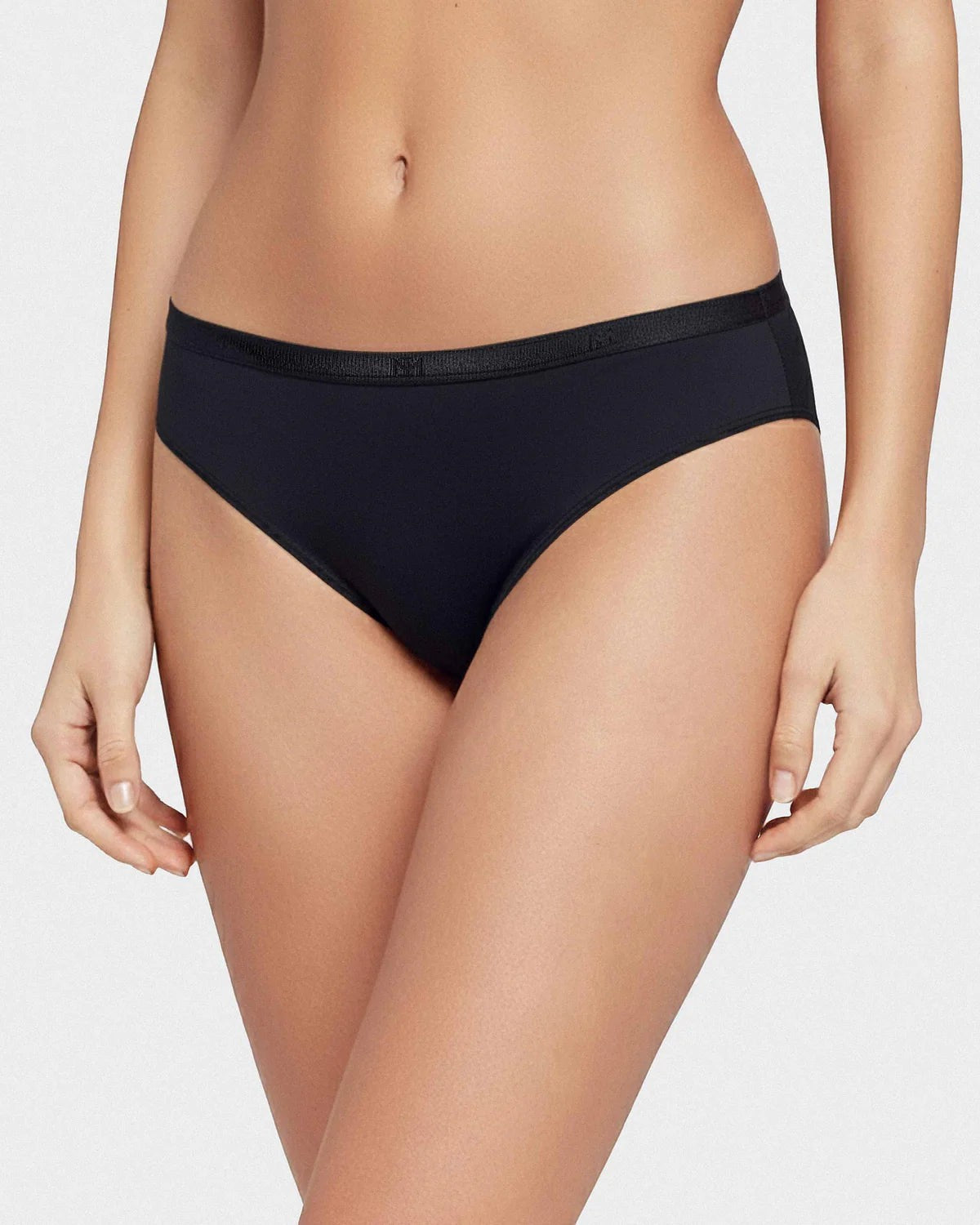 Maison Sarava black thong in Lyocell with elasticated waistband, soft and breathable.