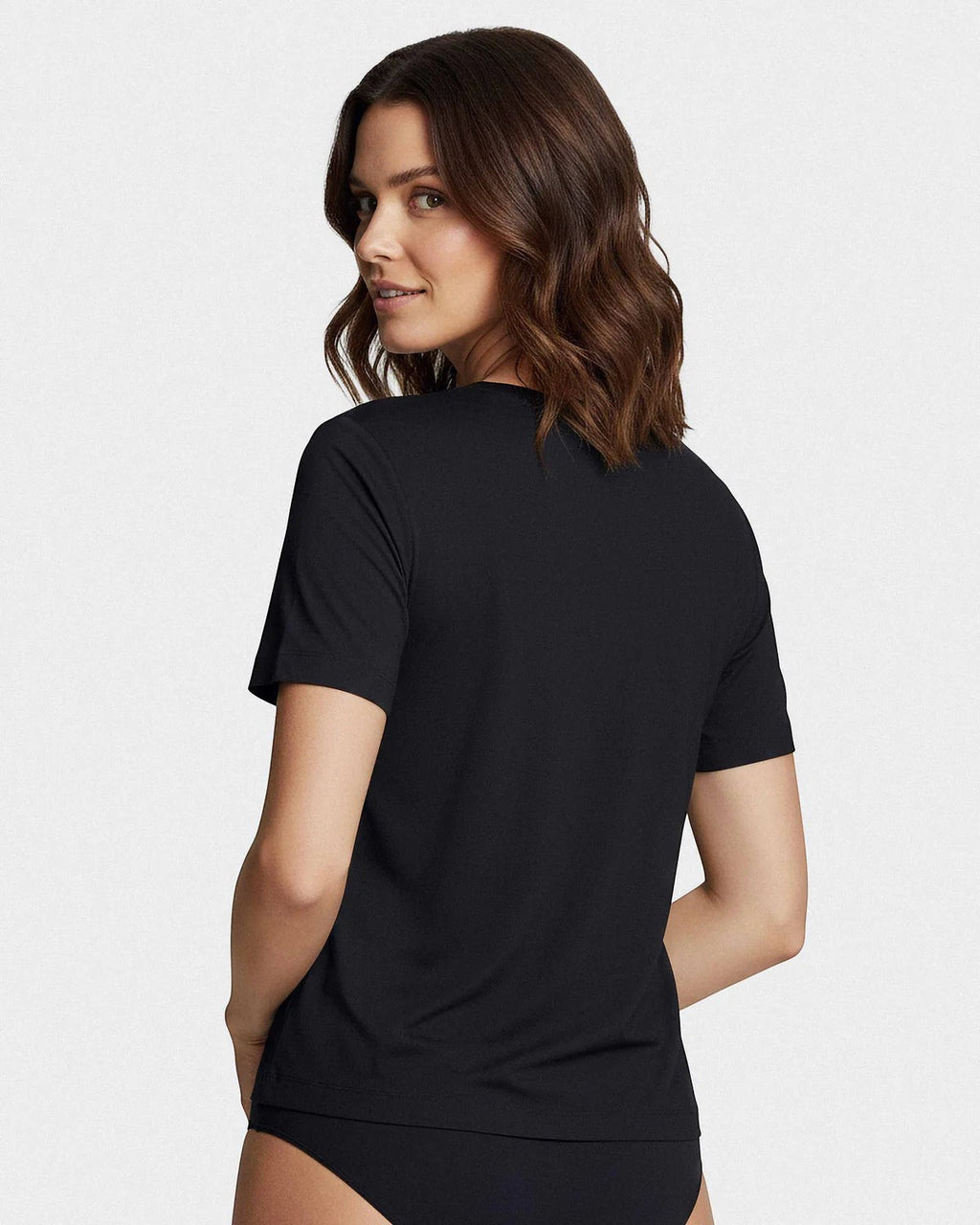 Maison Sarava women's black V-neck T-shirt made from soft, breathable TENCEL Lyocell. Short sleeves, comfortable fit.