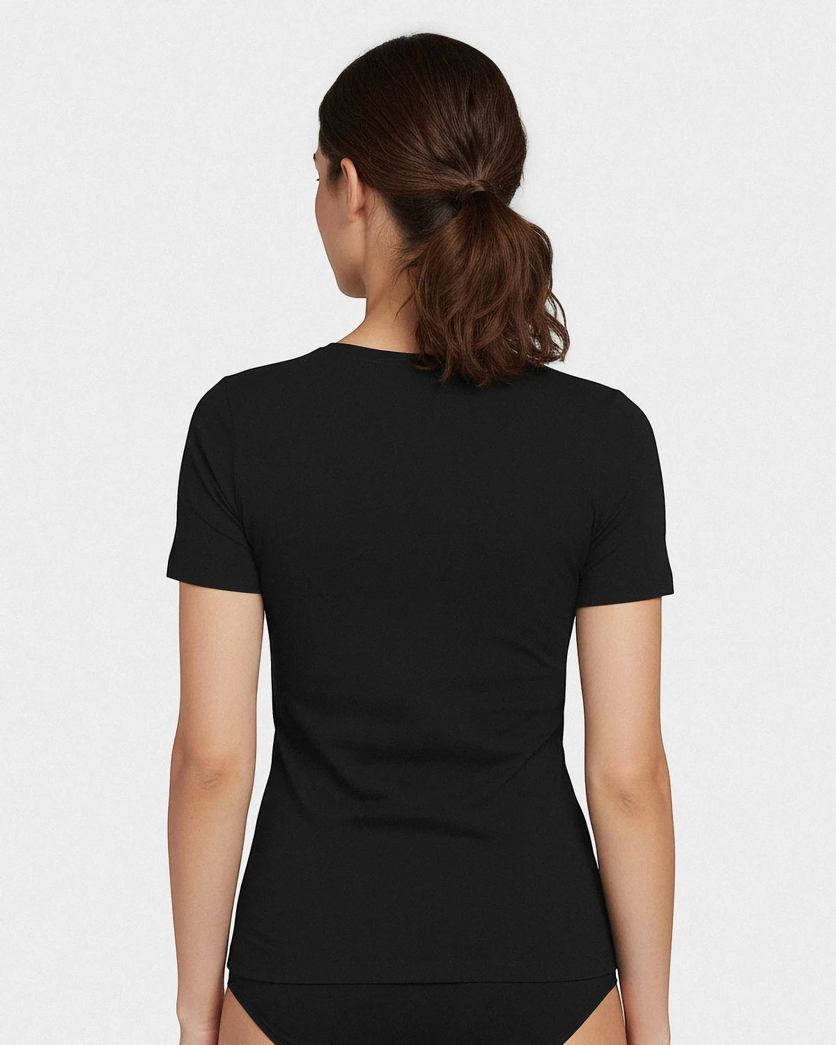 Maison Sarava black V-neck t-shirt made from cotton and viscose with Outlast® technology for temperature regulation.