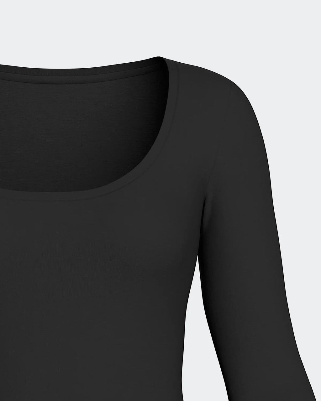 Maison Sarava black long sleeve scoop neck tee made from a soft Merino wool and Lyocell blend, ideal for layering.