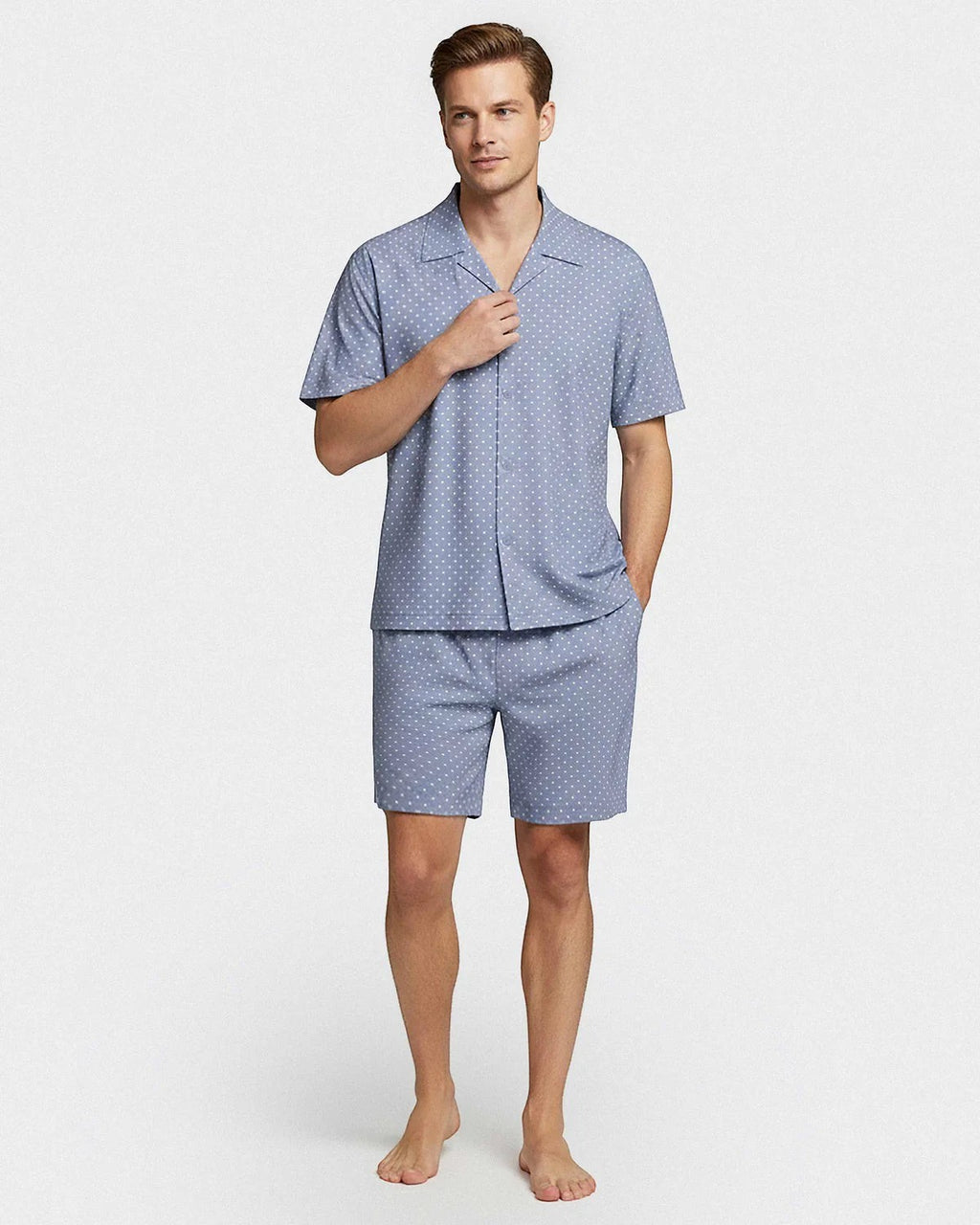 Maison Sarava men's blue 100% cotton short sleeve lounge set with white polka dots. Button-up shirt and elasticated shorts.