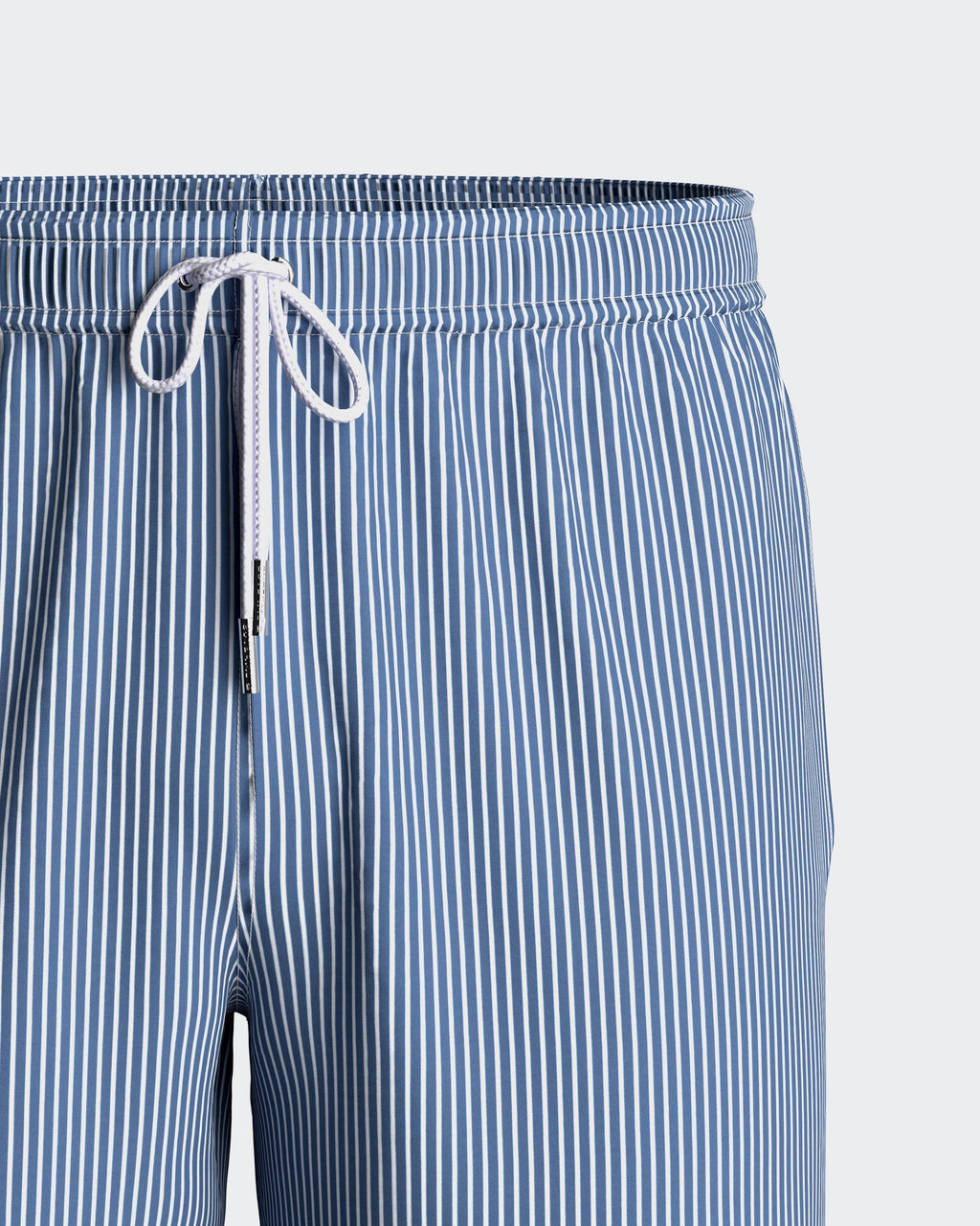 Maison Sarava blue and white striped men's swim shorts with drawstring and pockets.