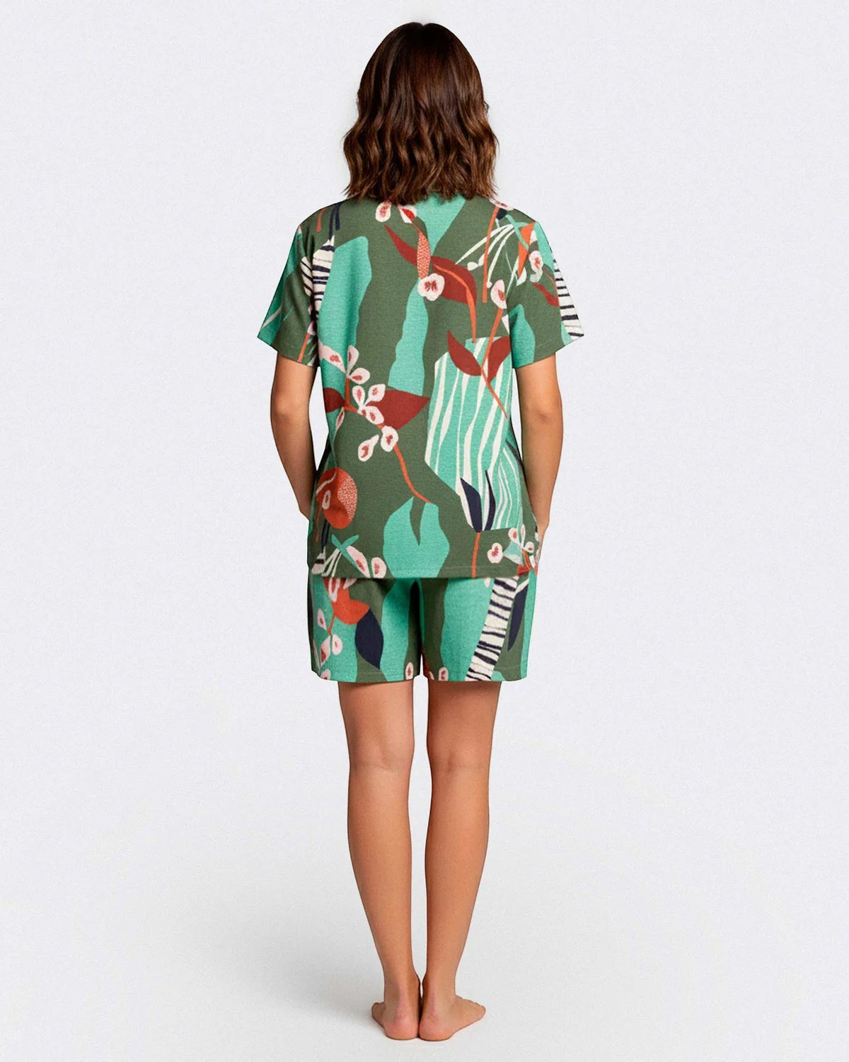 Maison Sarava women's green botanical print modal short sleeve lounge set with lapel collar shirt and shorts.