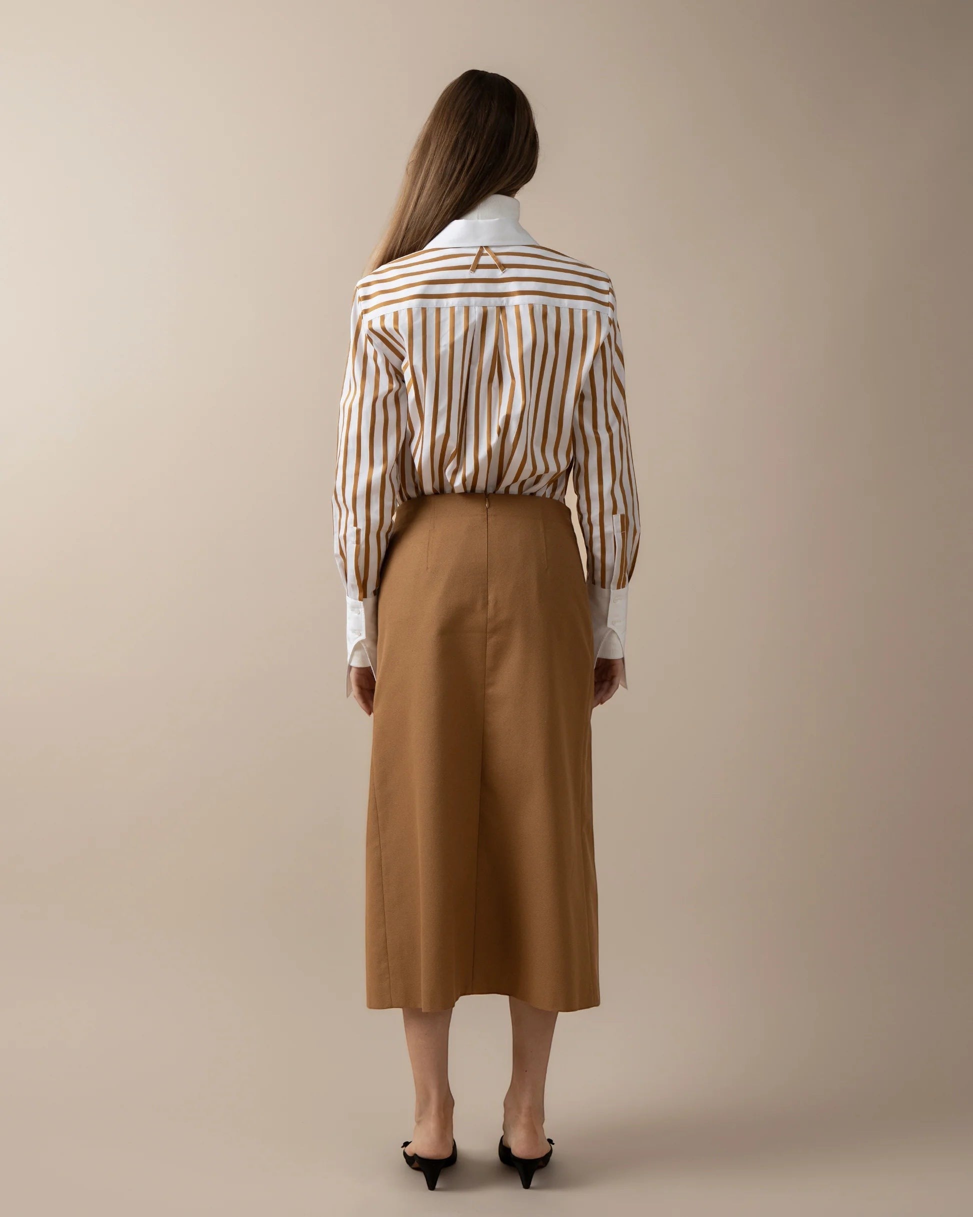 Maison Sarava women's camel straight-fit midi skirt with invisible back zip and front double vent.
