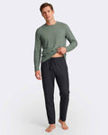 Maison Sarava men's dark grey lounge pants with drawstring waist and relaxed fit, paired with a sage green long-sleeve shirt.