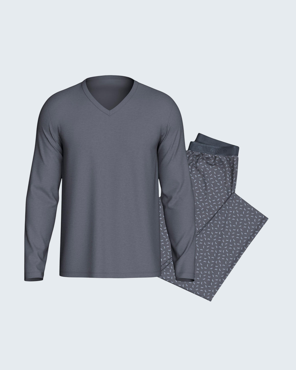 Maison Sarava grey long sleeve V-neck pajama top with patterned pajama pants.