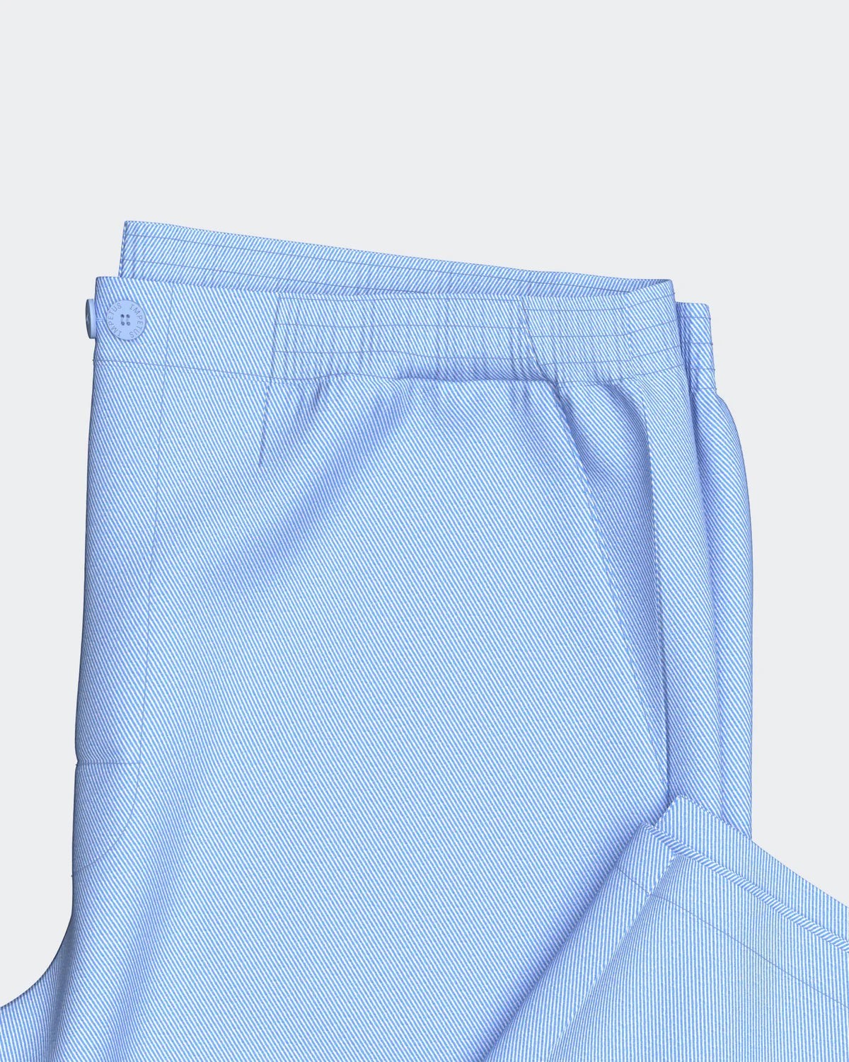 Maison Sarava light blue striped pajama set with black piping detail on pocket and button closure.