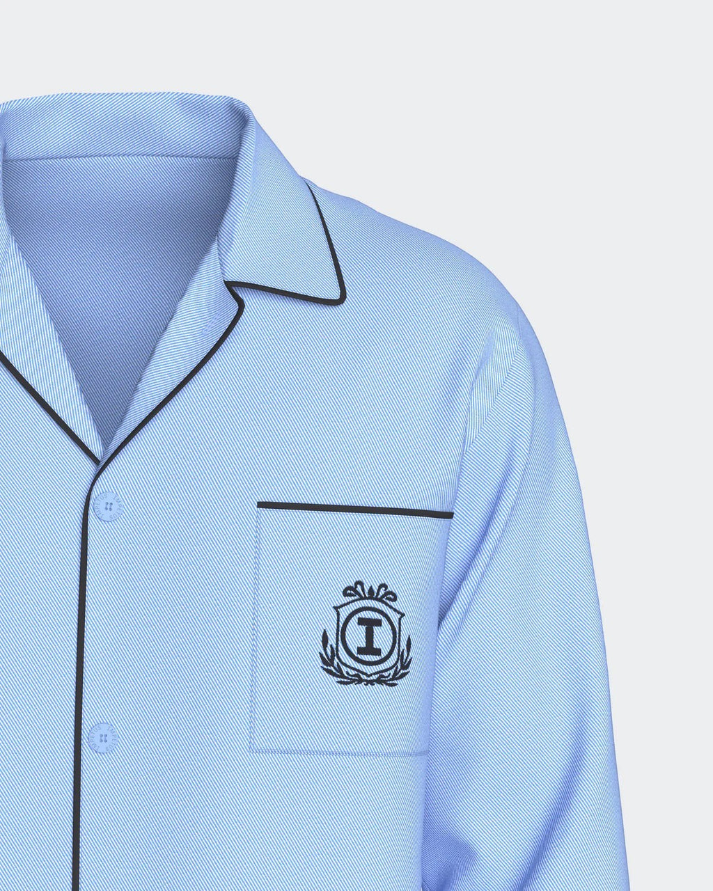 Maison Sarava light blue cotton blend pajama set with black piping and embroidered crest on pocket.
