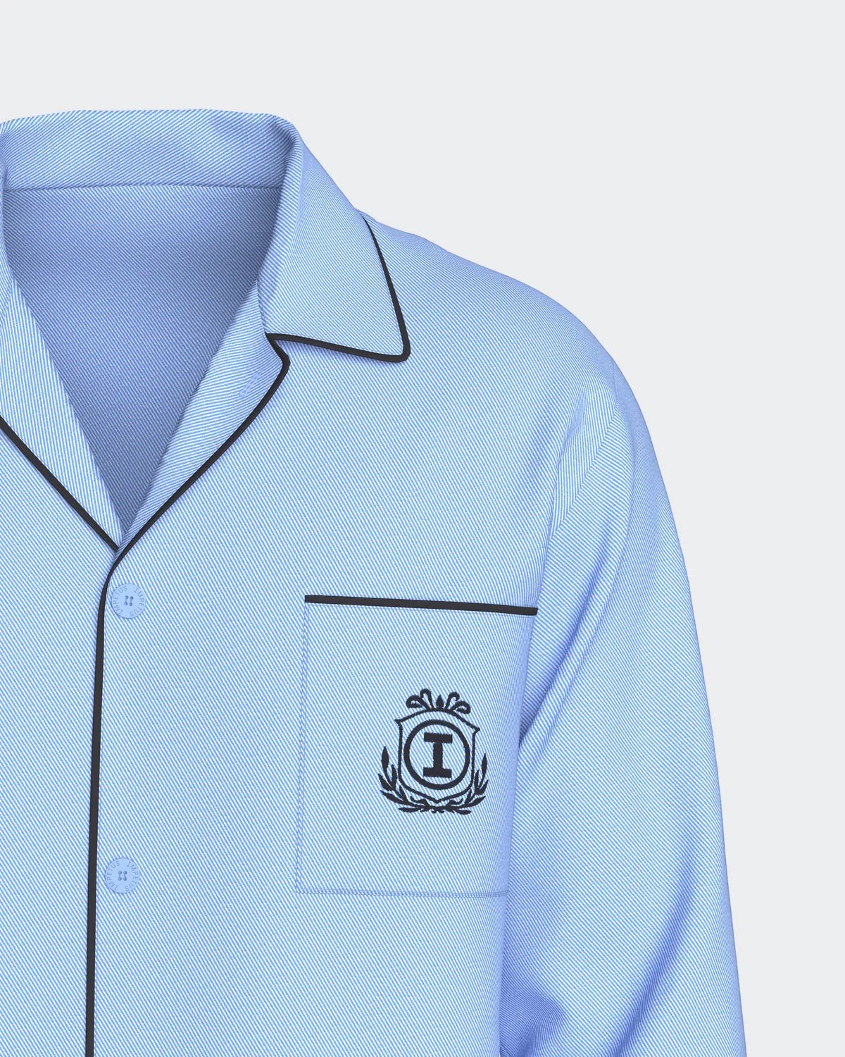 Maison Sarava light blue cotton blend pajama set with black piping and embroidered crest on pocket.