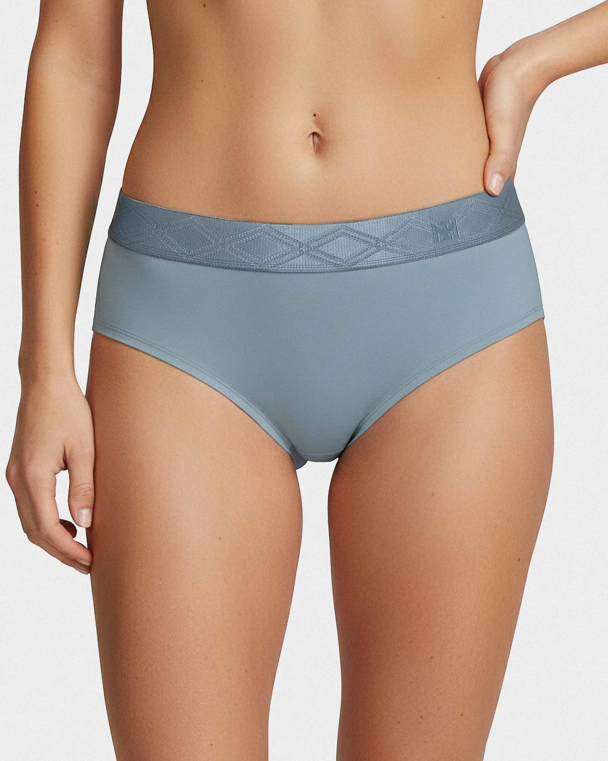 Maison Sarava women's blue briefs made from TENCEL™ Lyocell with a satin elasticated waistband featuring a subtle diamond pattern.