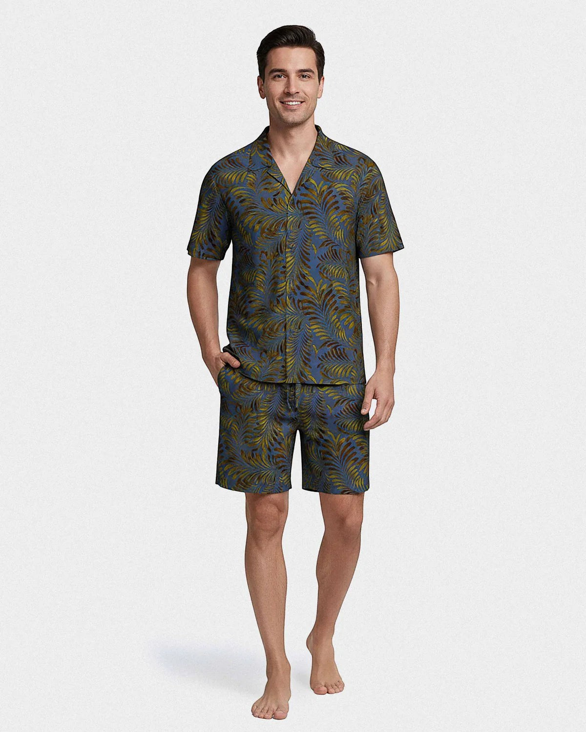 Maison Sarava men's blue lyocell lounge set with tropical print, short sleeves, lapel collar, and drawstring shorts.