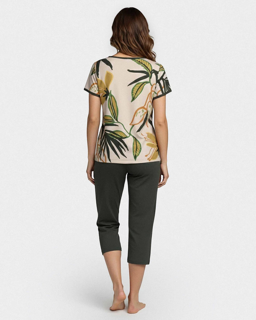 Maison Sarava women's short sleeve lounge set with tropical print top and plain capri trousers in beige and dark green, made from Lyocell.