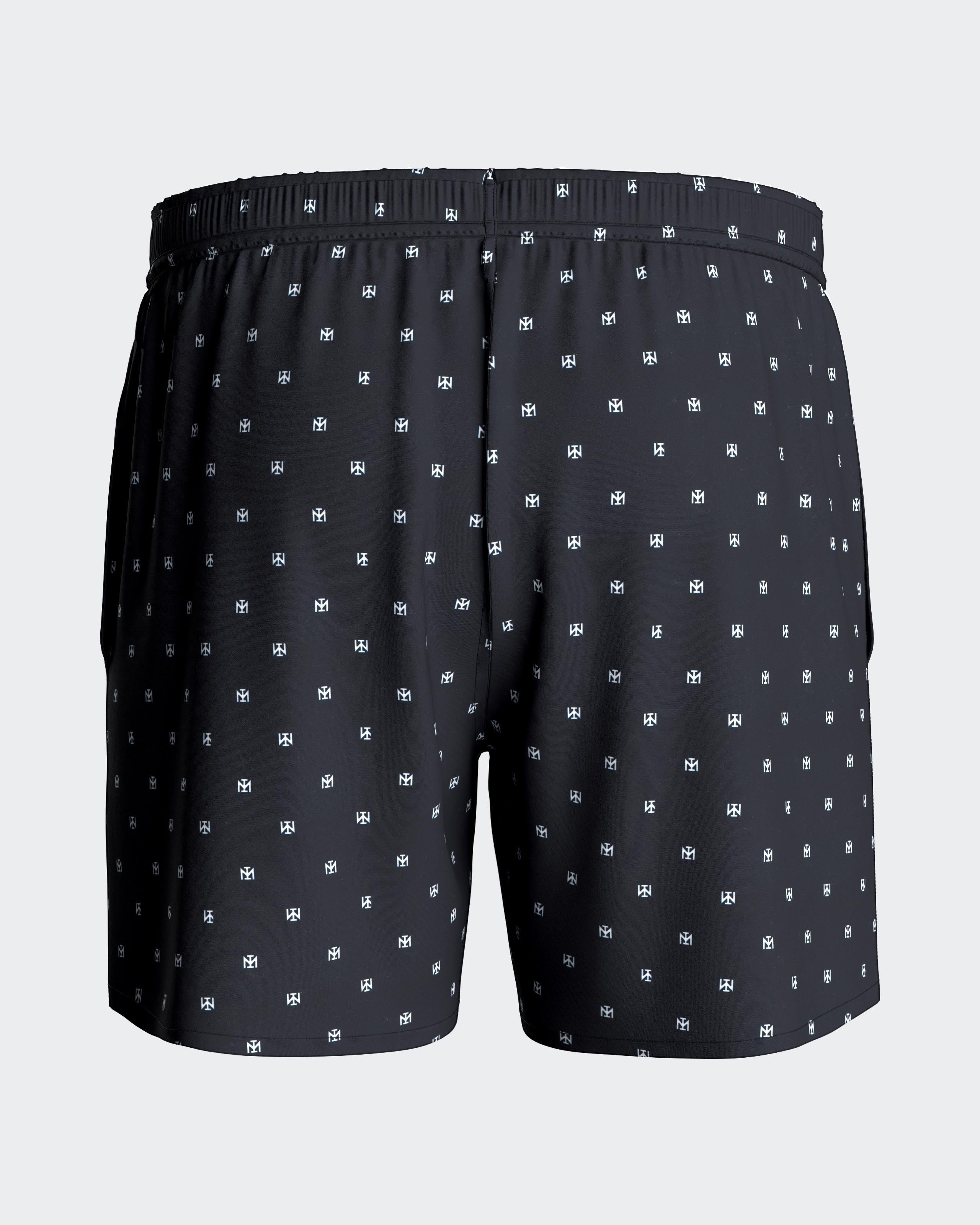 Maison Sarava men's black swim trunks with micro-pattern logo, elastic waistband, drawstring, side pockets, and inner mesh lining.