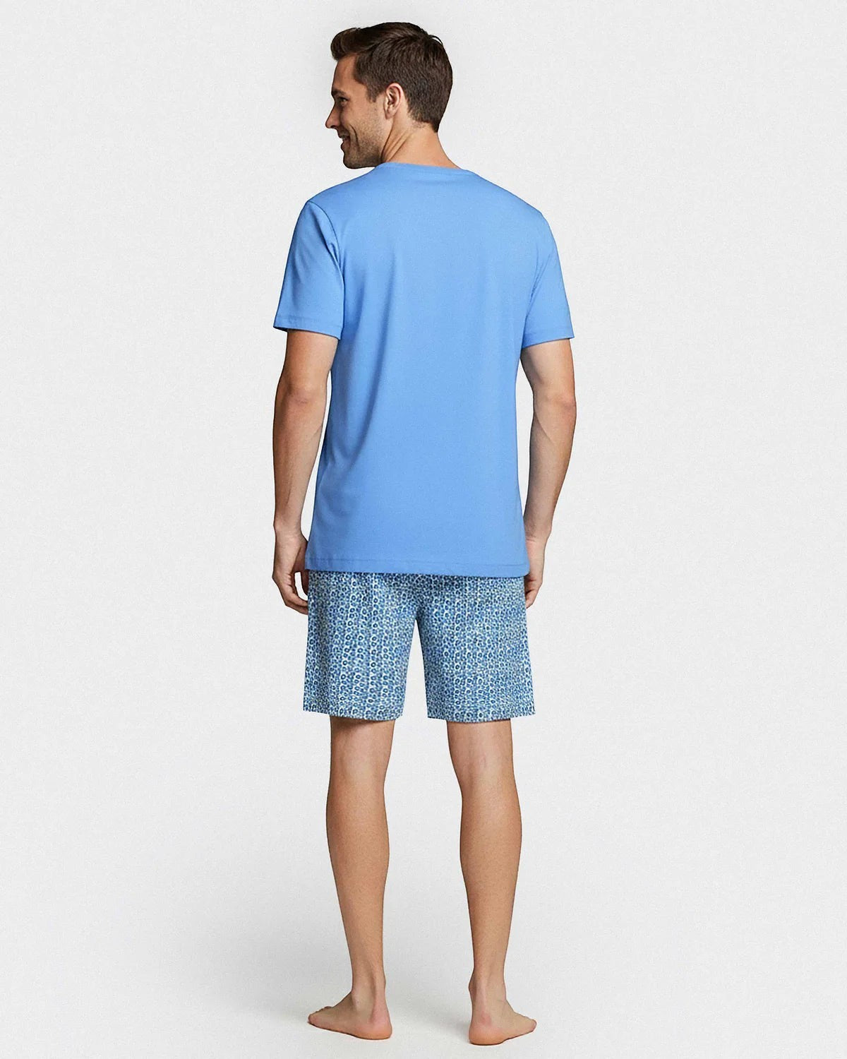 Maison Sarava men's blue 100% cotton short sleeve lounge set with geometric print shorts and two-button placket top.