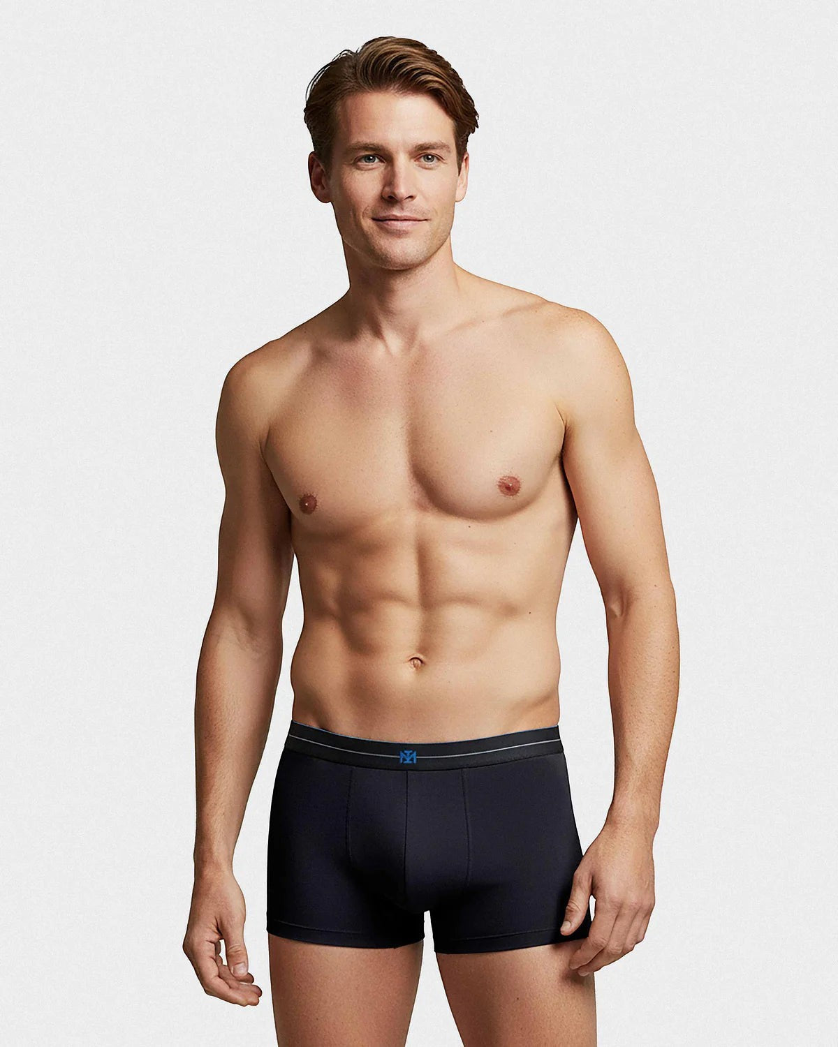 Maison Sarava men's navy cotton boxer briefs with elasticated waistband and subtle geometric logo detail.