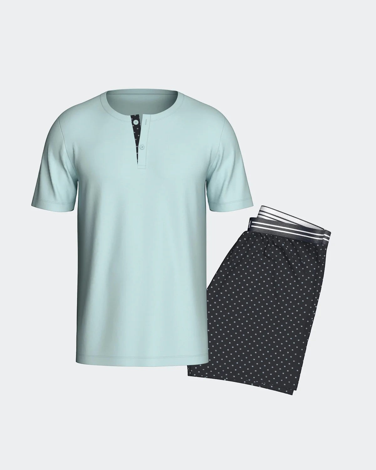 Maison Sarava men's light blue cotton short sleeve henley t-shirt with a navy micro logo pattern placket and matching navy micro logo pattern shorts with elastic waistband.