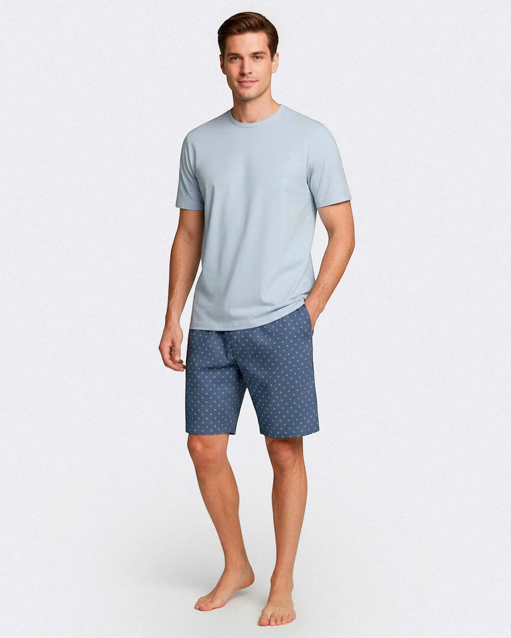 Maison Sarava men's light blue cotton t-shirt and blue geometric print shorts loungewear set.