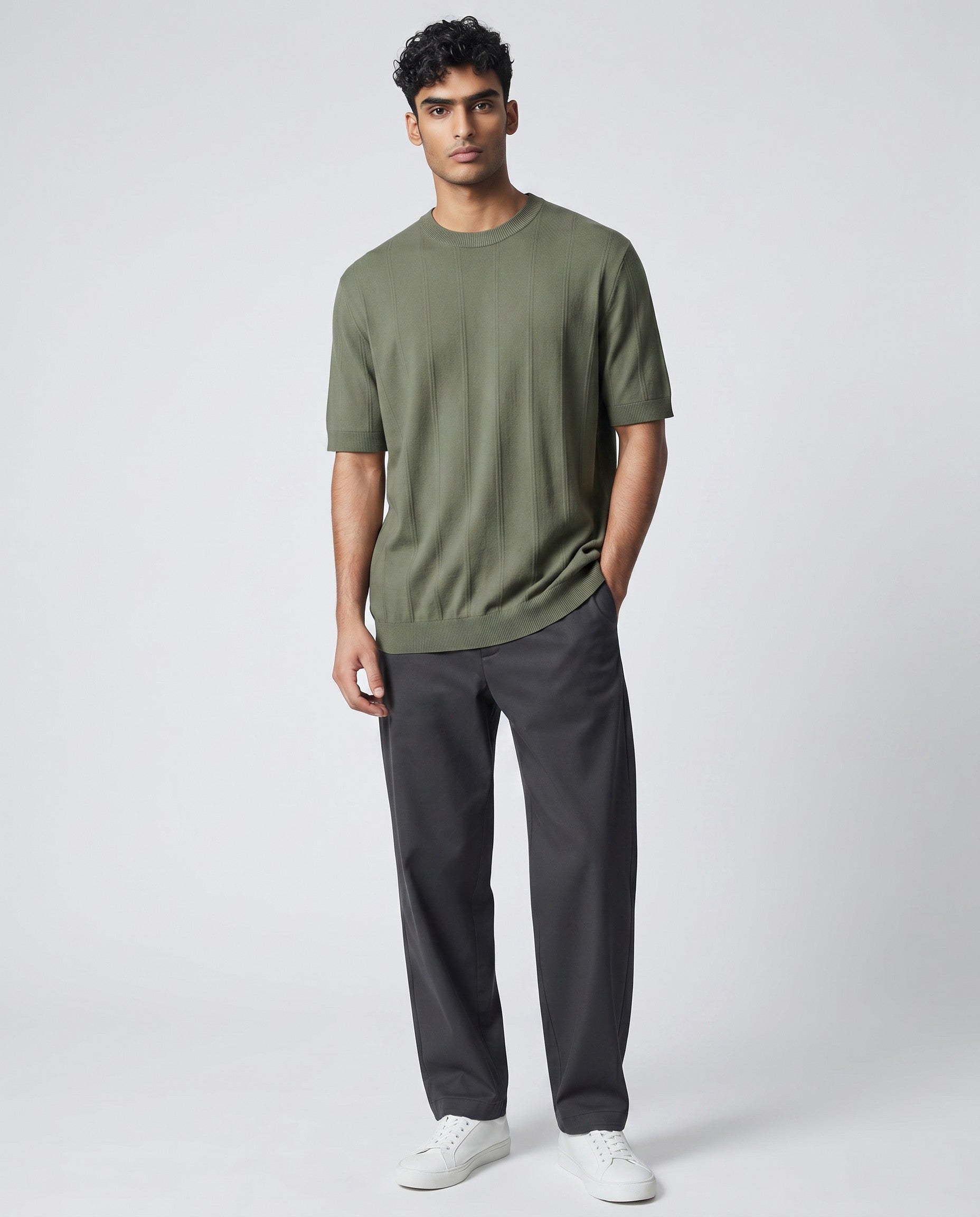 Maison Sarava men's olive green textured knit short sleeve sweater with crew neck and ribbed cuffs and hem.