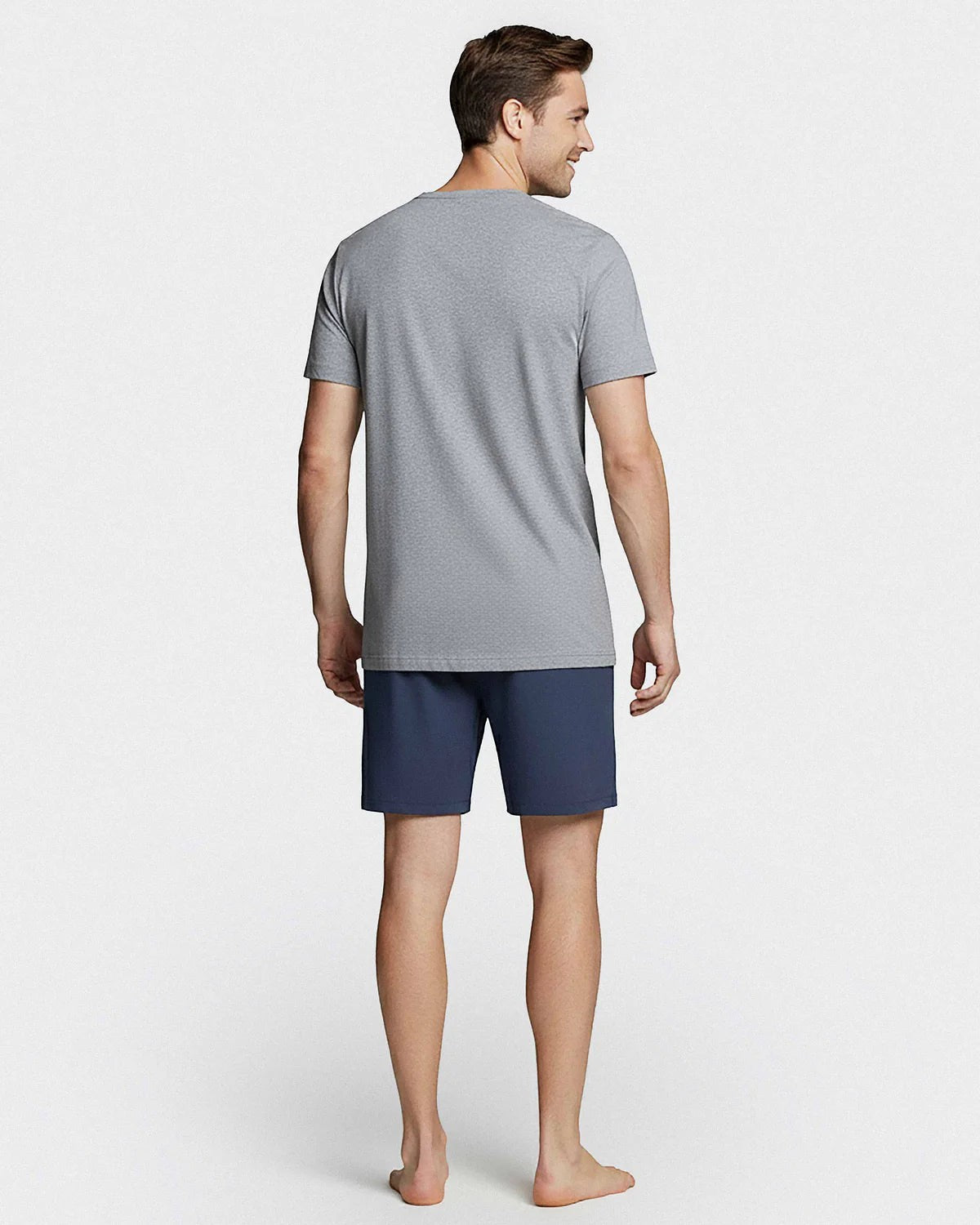 Maison Sarava men's grey V-neck cotton t-shirt and navy blue shorts lounge set. T-shirt has a printed logo.