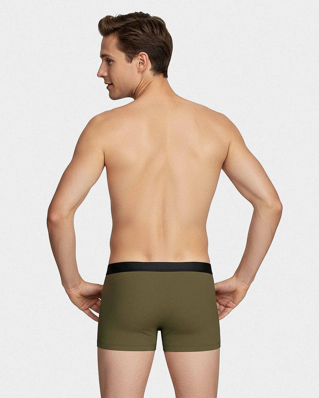 Maison Sarava men's olive green lyocell boxer briefs with black elastic waistband. Model shown from the back.