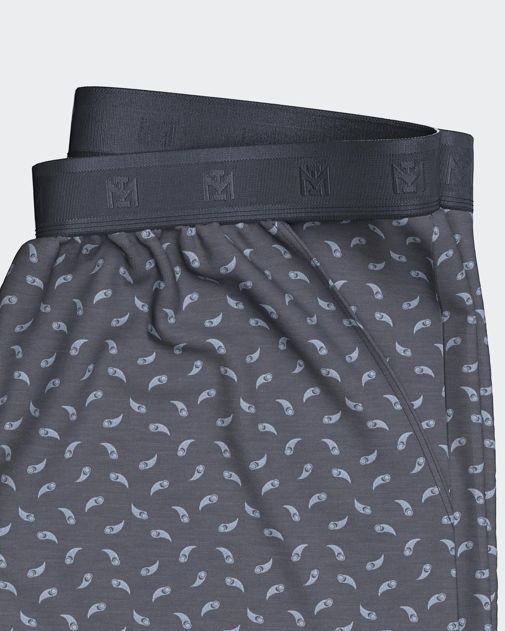 Maison Sarava men's dark grey lyocell lounge shorts with a subtle paisley print and branded elastic waistband.