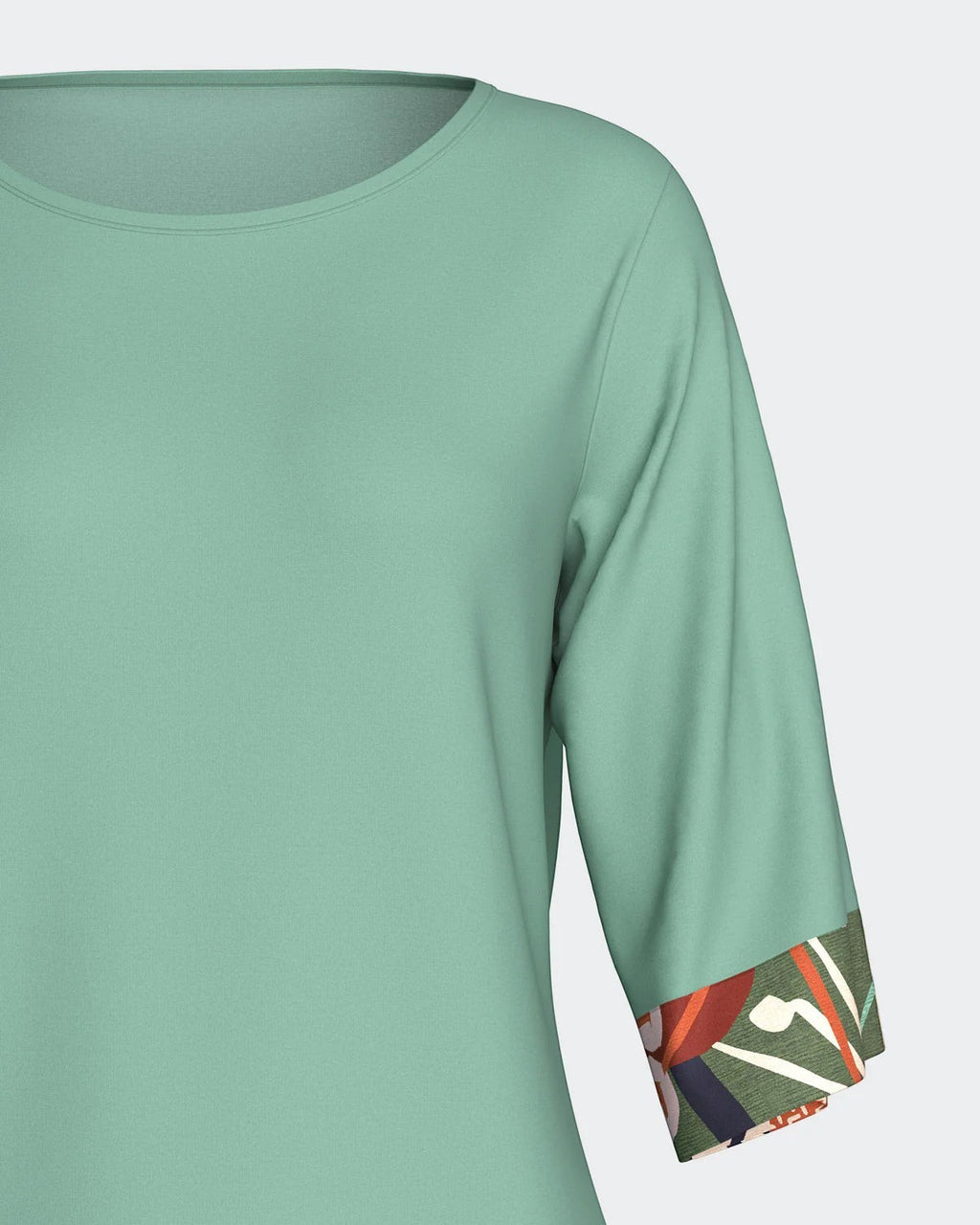 Maison Sarava mint green modal lounge set with 3/4 sleeves and tropical print cuffs.