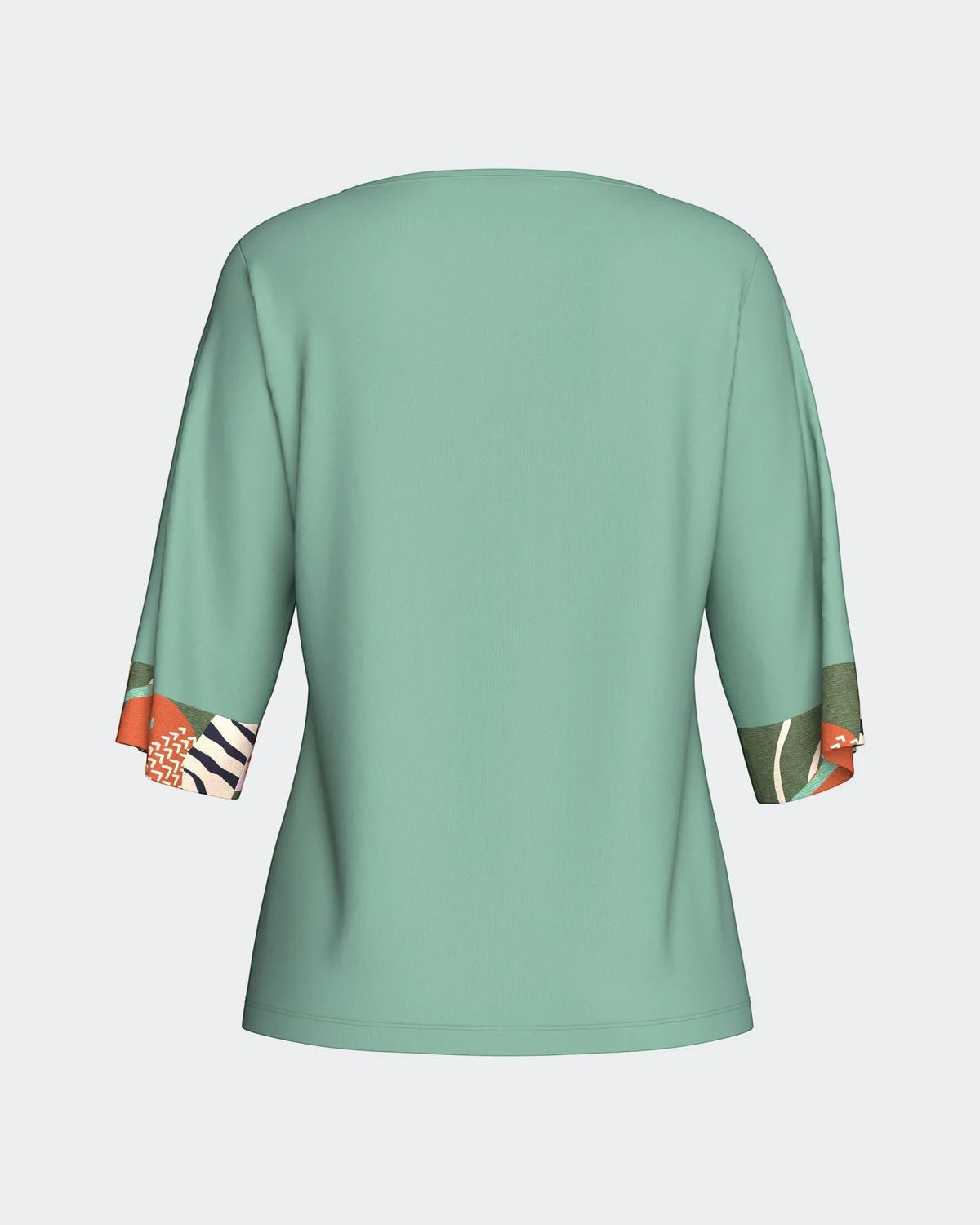Maison Sarava mint green modal lounge top with 3/4 sleeves and contrasting tropical print cuffs.