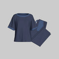 Maison Sarava women's navy blue lyocell cotton short sleeve lounge set with contrasting trim on neckline and sleeves.