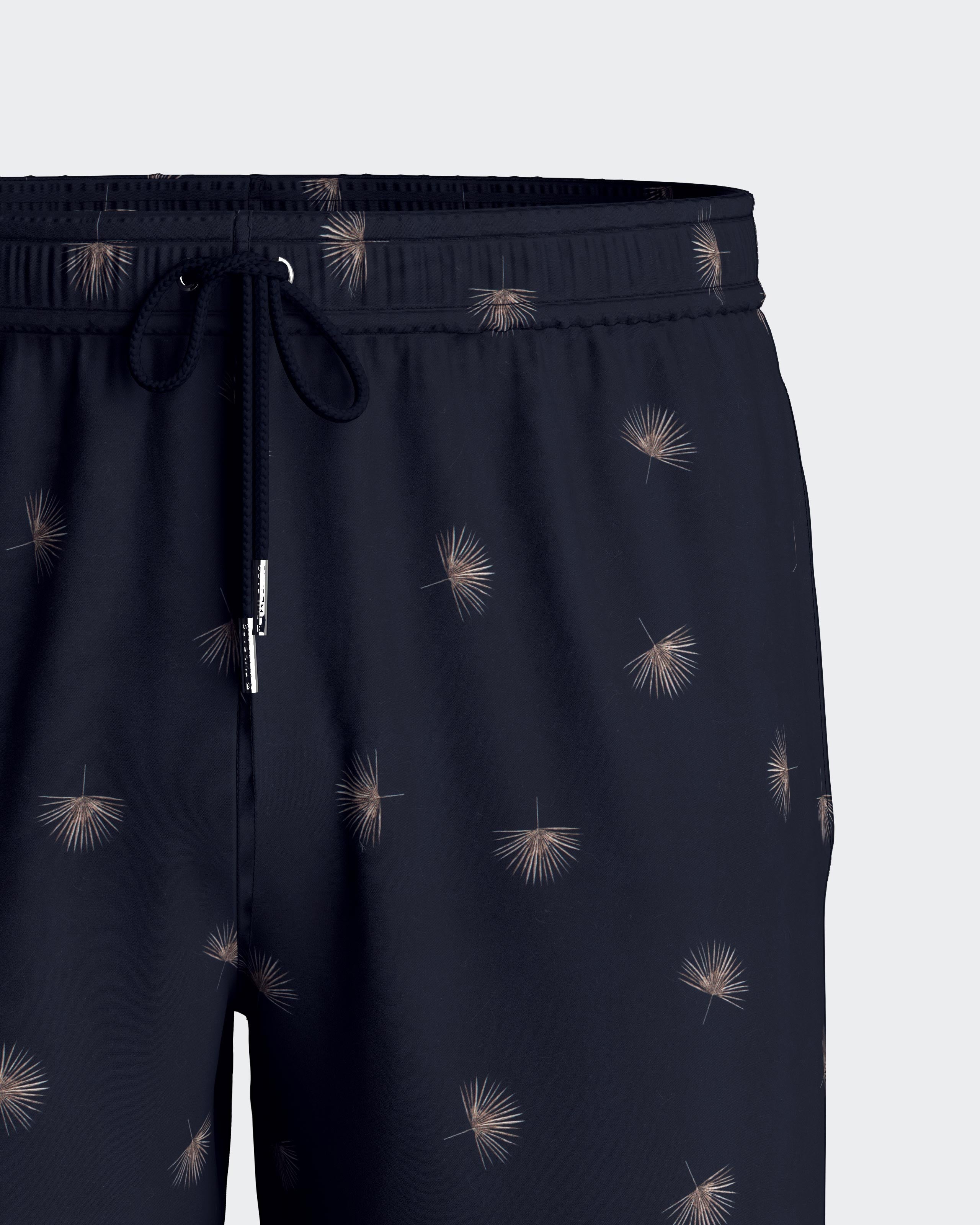 Maison Sarava men's navy blue swim trunks with a subtle micro-pattern, elastic waistband, drawstring, and side pockets.
