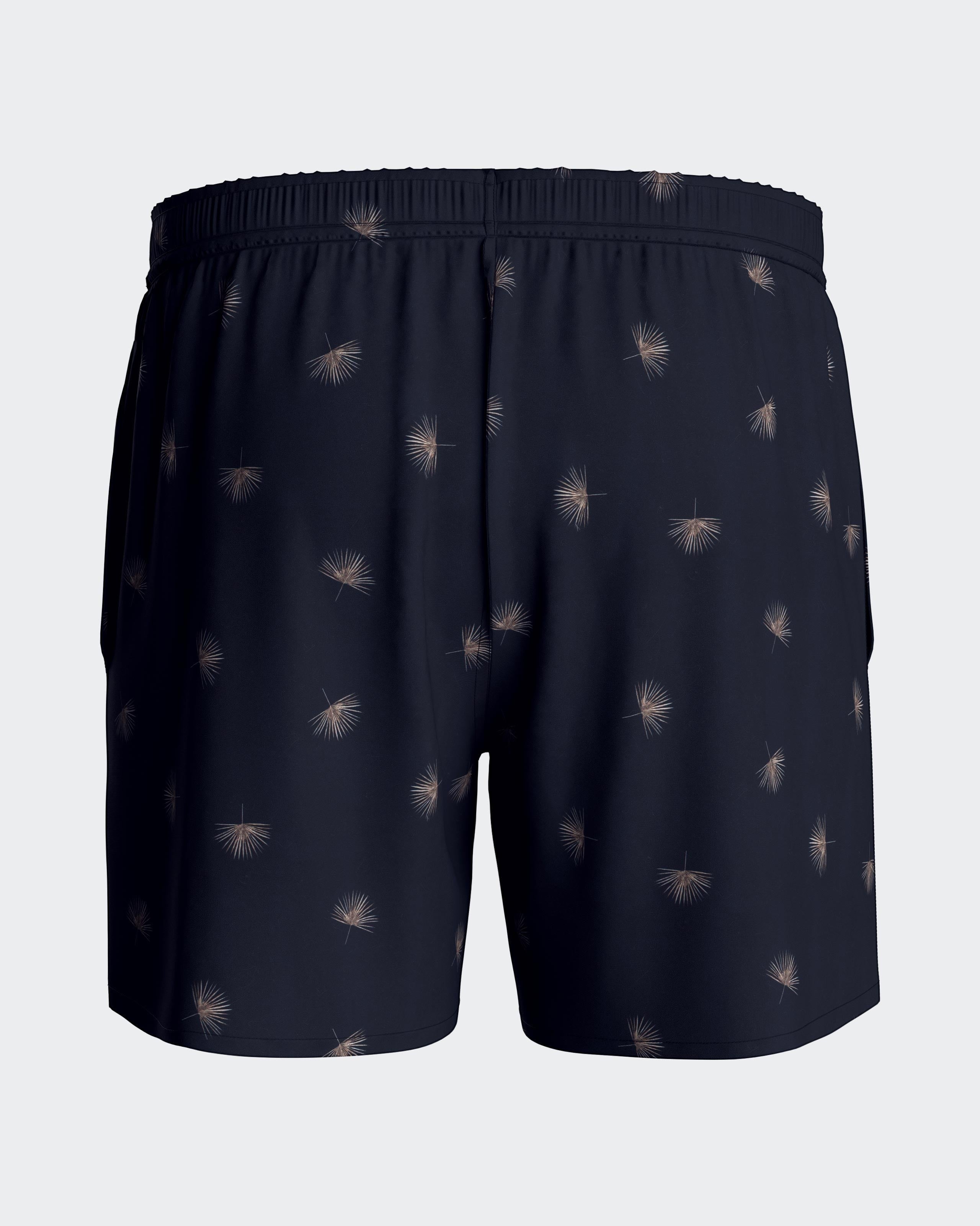 Maison Sarava navy blue men's swim trunks with micro-pattern, elastic waistband, drawstring, side pockets, and inner mesh lining.