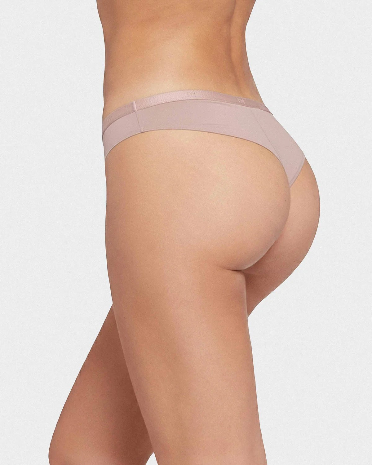 Maison Sarava women's nude lyocell thong with a seamless elasticated waistband.