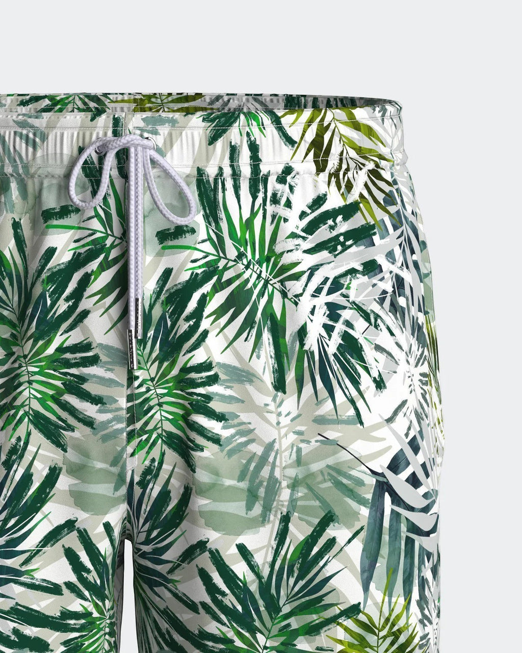 Maison Sarava men's white and green palm leaf print polyester swim shorts with drawstring waist.